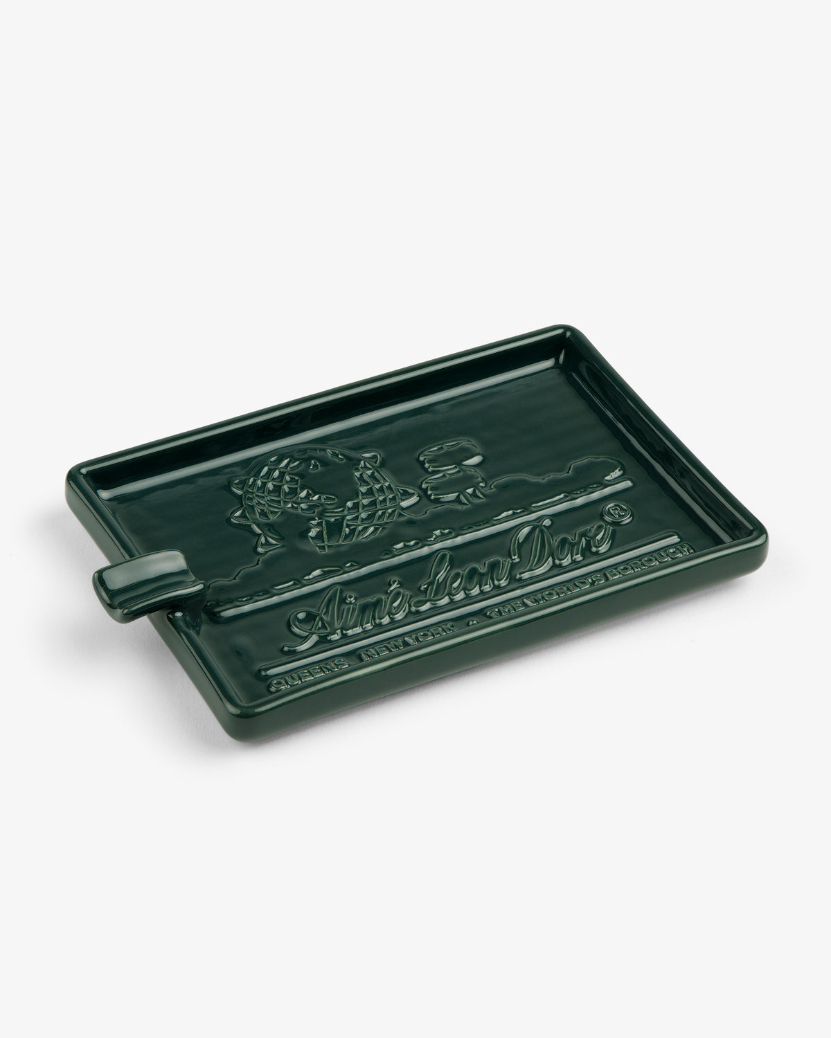 Dark green rectangular Ceramic Unisphere Ashtray with embossed text and graphics on the surface.