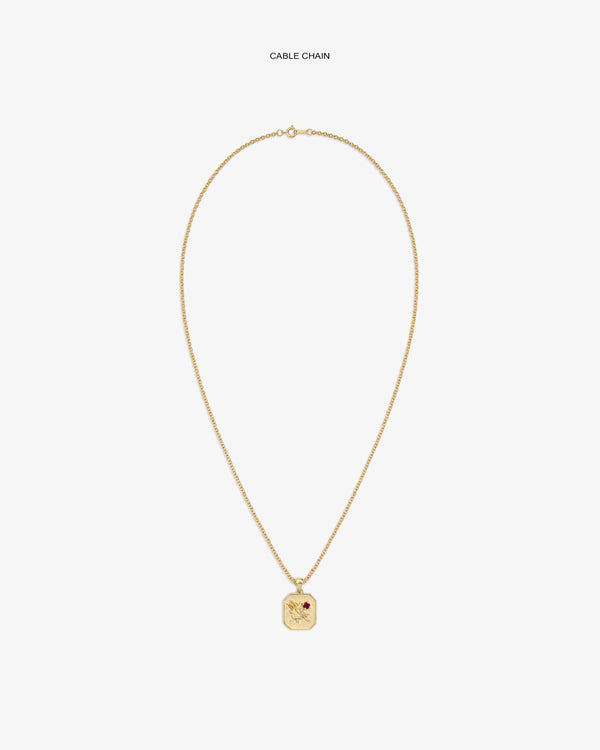 14Kt Gold Queens Crest Relief Pendant on a cable chain, featuring an engraved crest and a small red gemstone accent.