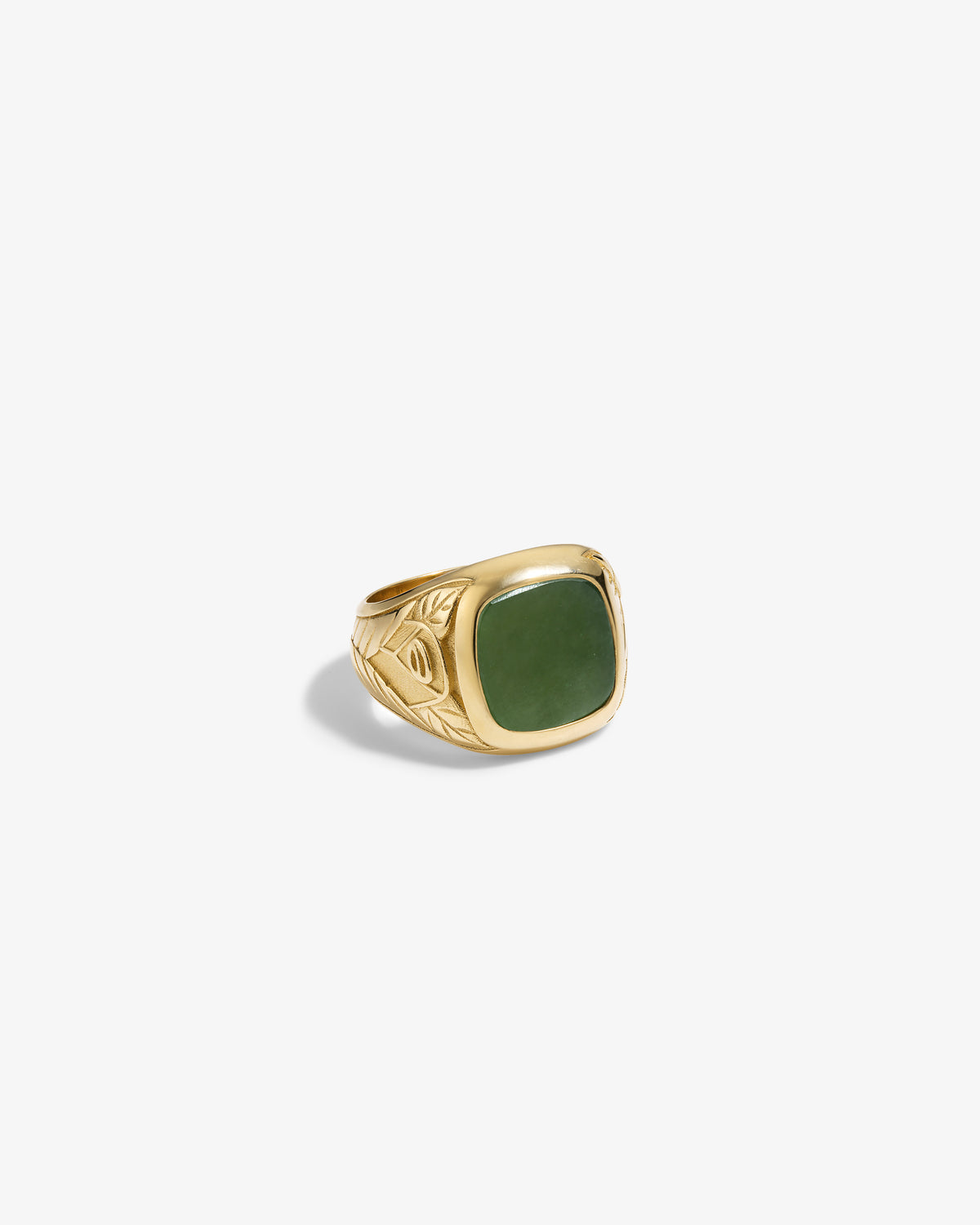 14Kt Gold Jade Signet Ring featuring a rectangular dark green stone and engraved band on a white background.