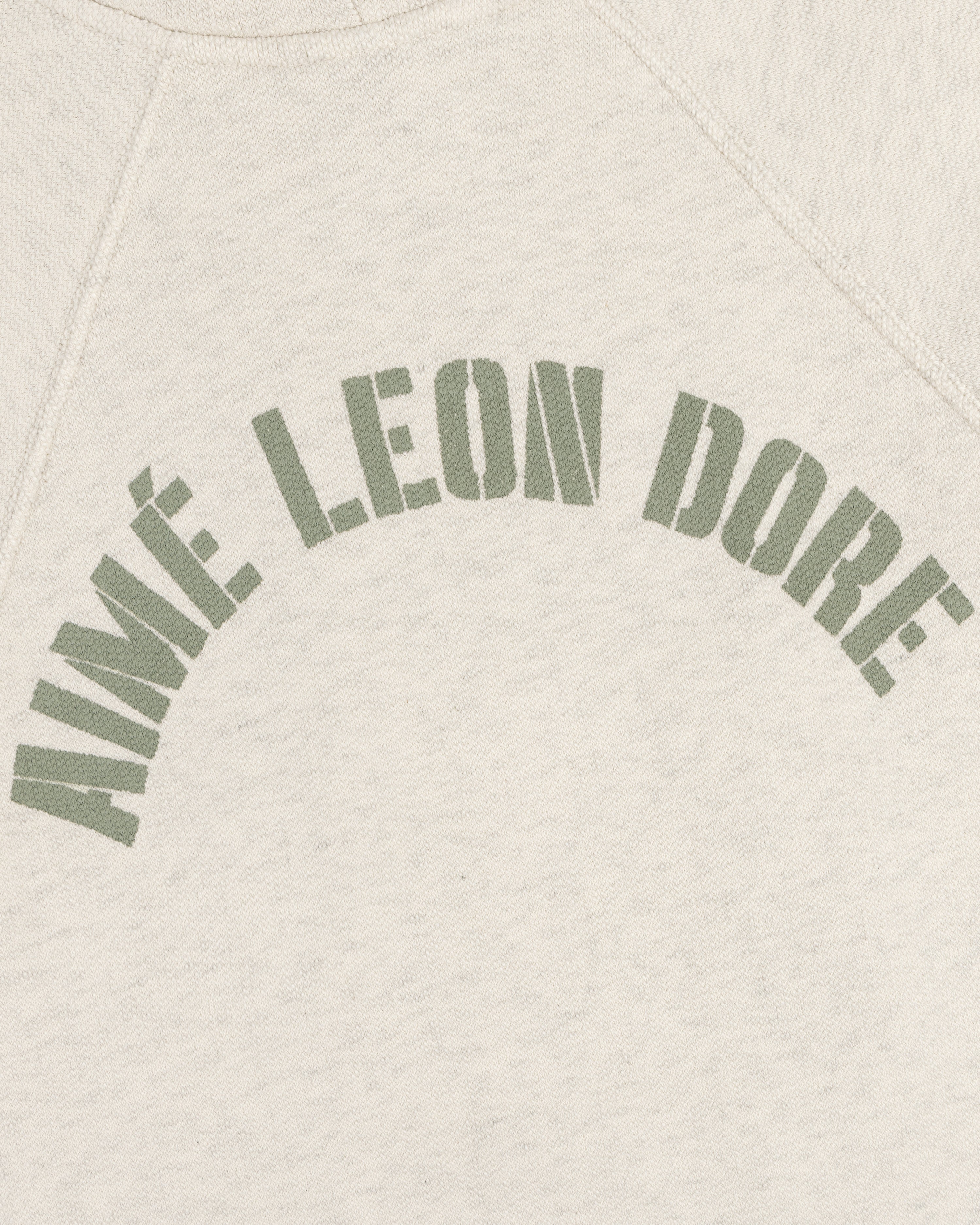 Cream Dock Hoodie with AIMÉ LEON DORE in bold, olive green, arched block letters across the chest.