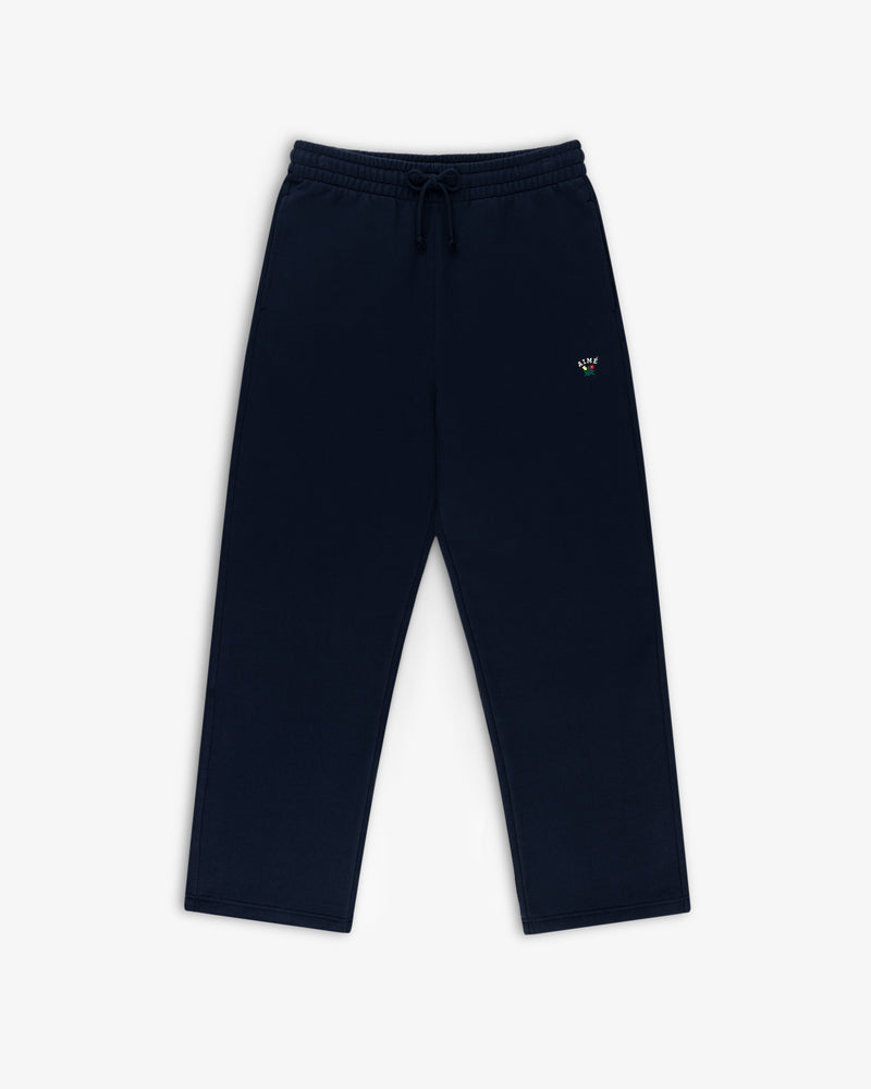 Crest Sweatpants: navy blue, elastic waistband, drawstring, small embroidered logo on left thigh.