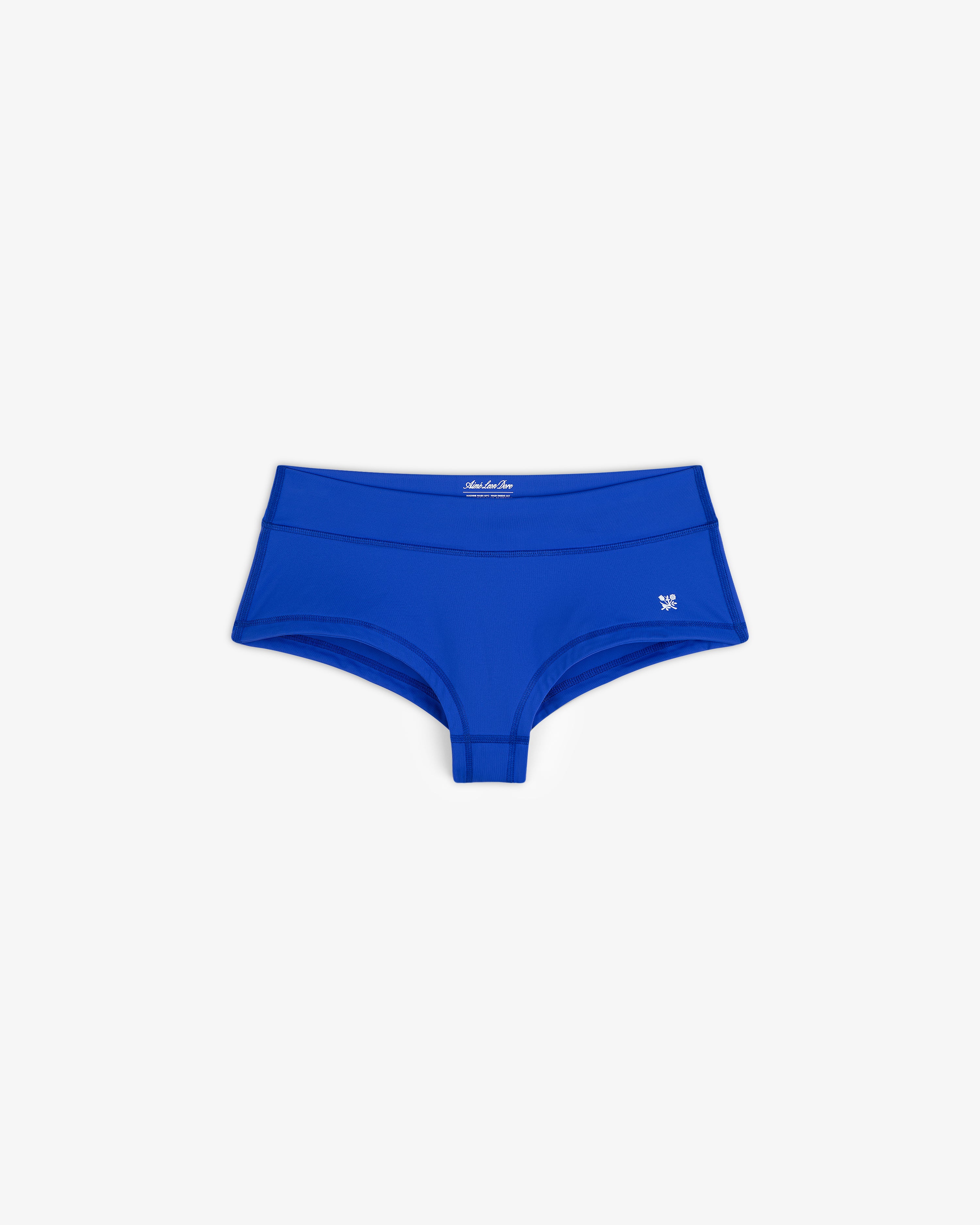 Crest Swim Short for women in bright blue, shown laid flat on a white background.