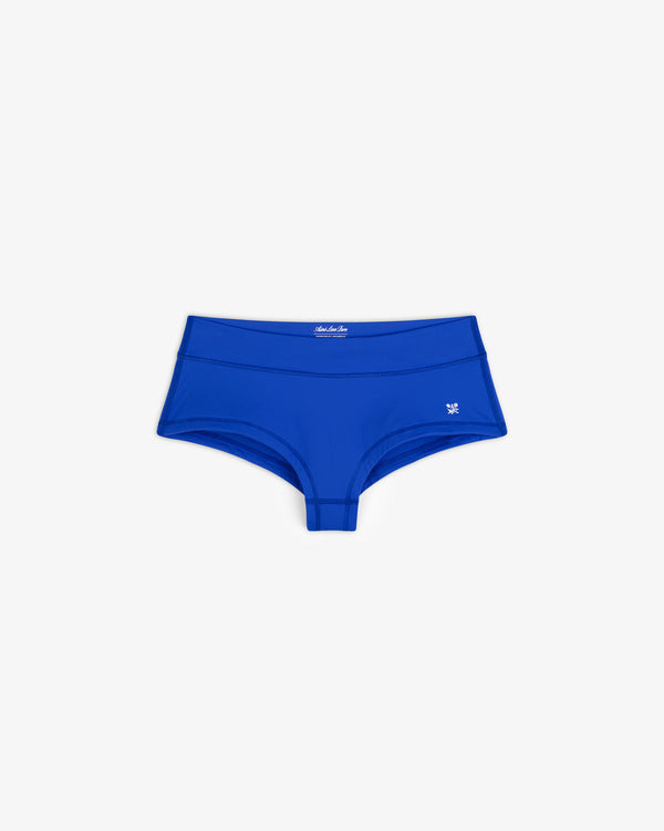 Crest Swim Short for women in bright blue, shown laid flat on a white background.