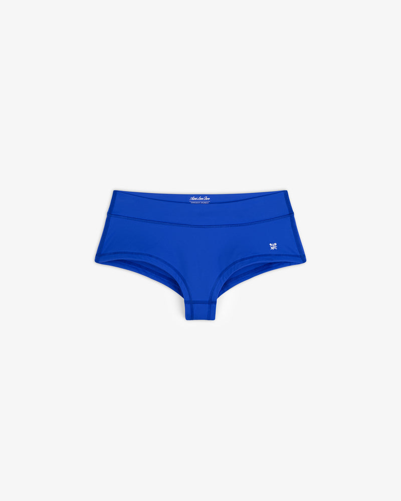 Crest Swim Short for women in bright blue, shown laid flat on a white background.