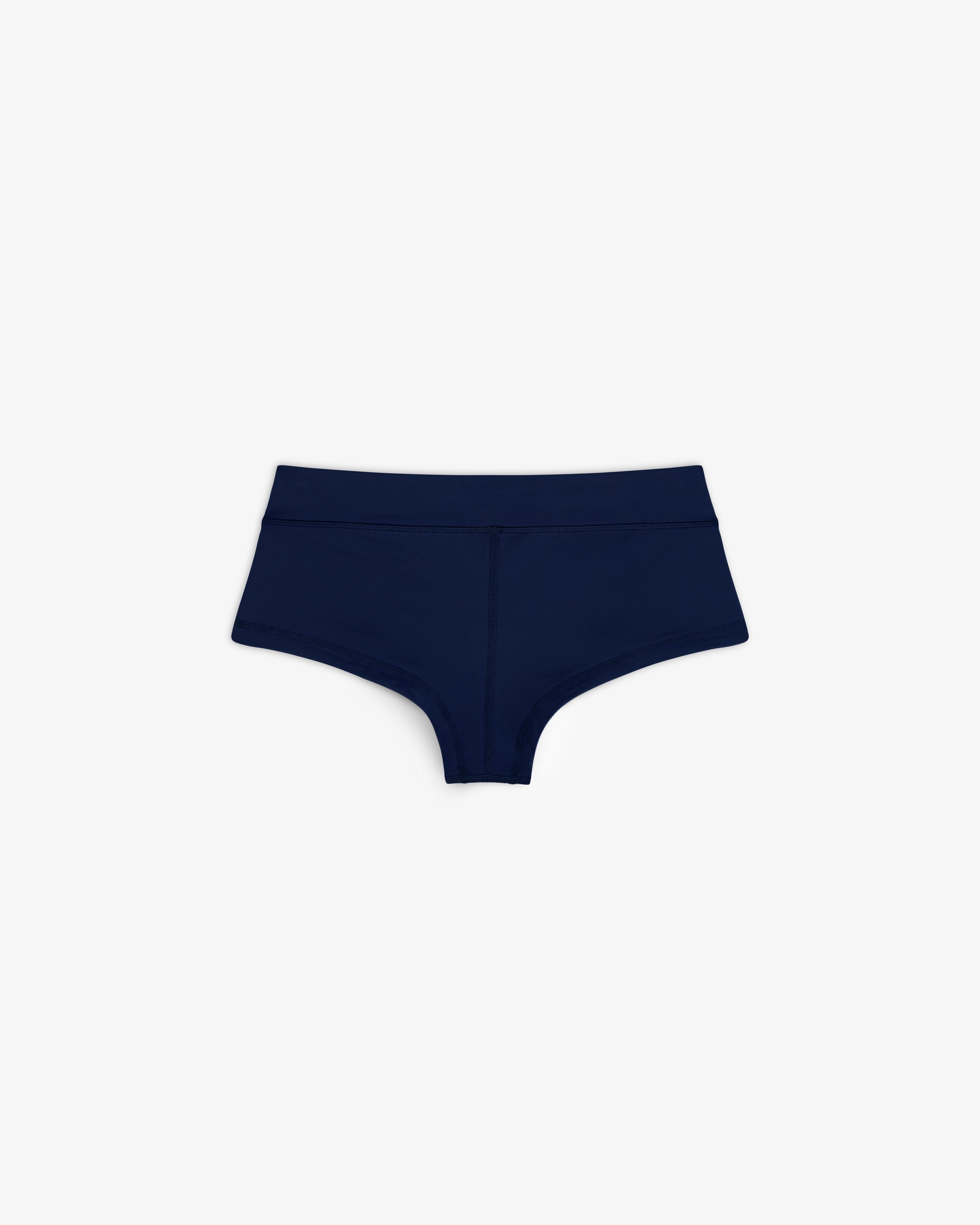 Crest Swim Short in dark blue for women, boyshort style, shown on a plain white background.