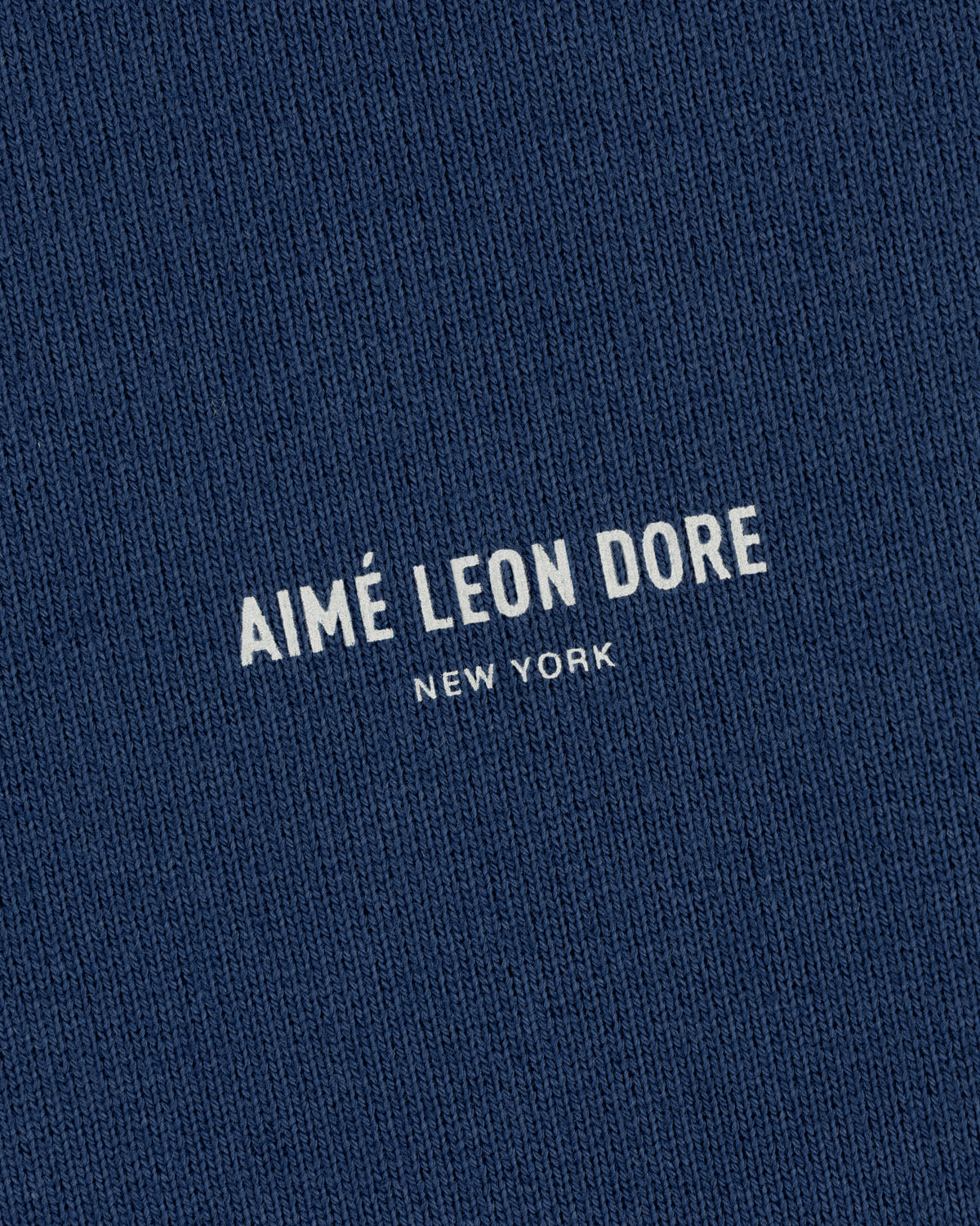 Blue textured Safari Crewneck Sweatshirt with AIMÉ LEON DORE NEW YORK printed in white at the center.