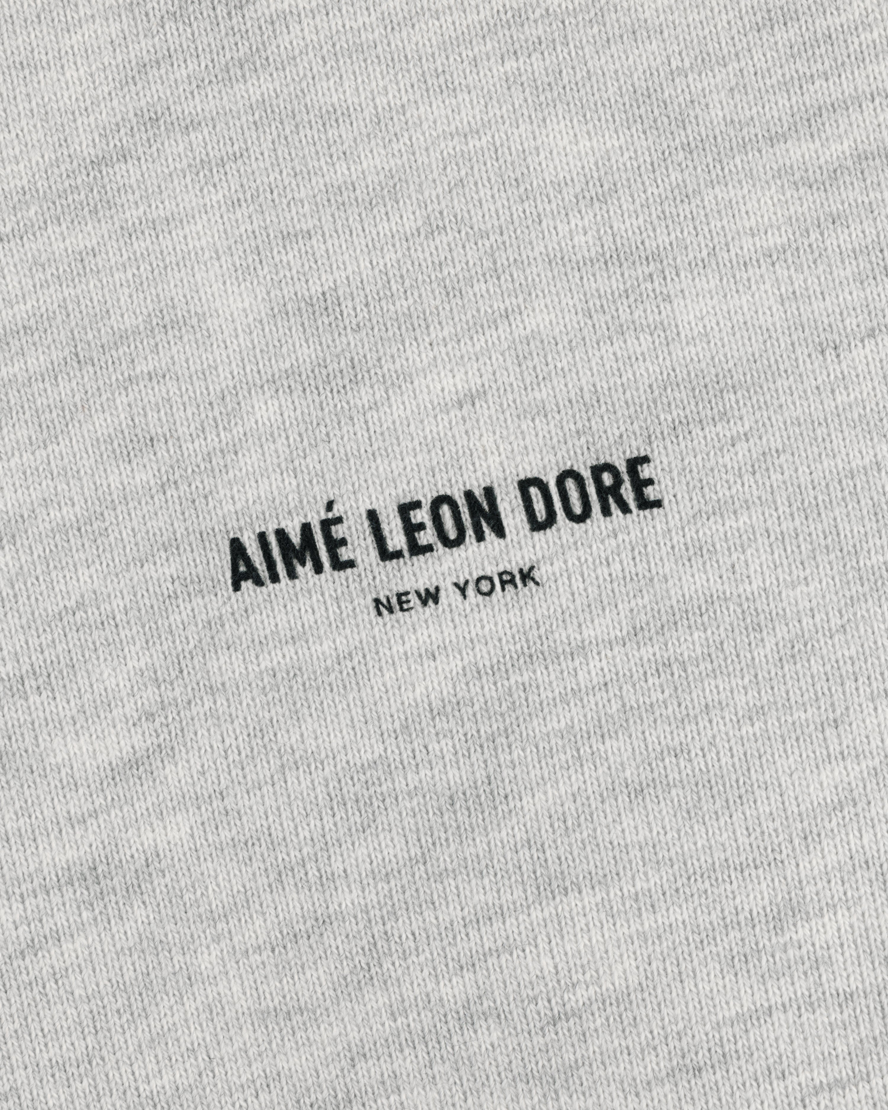 Gray Safari Crewneck Sweatshirt with minimalist centered "AIMÉ LEON DORE NEW YORK" in black text.