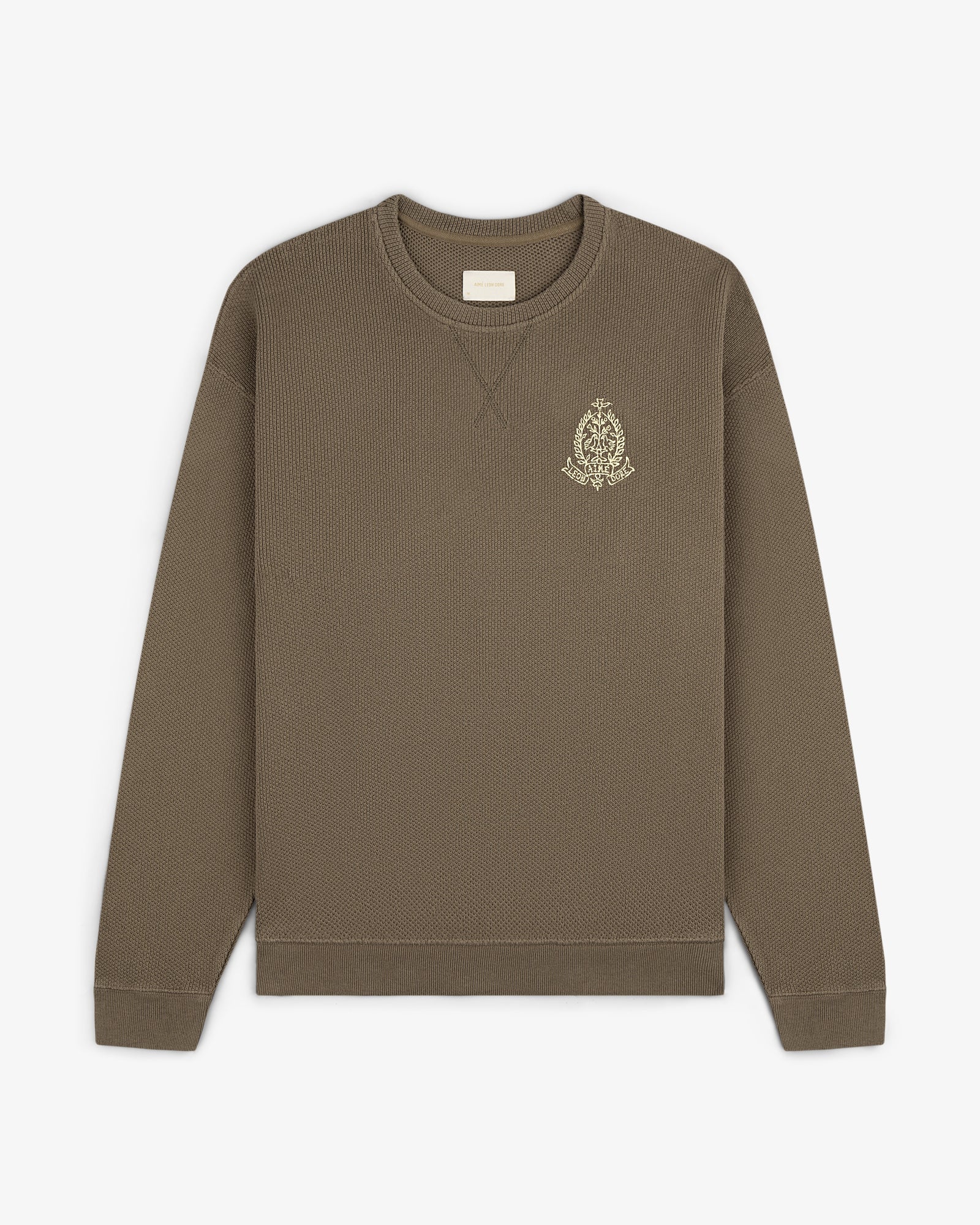 Saint George Piqué Crewneck Sweatshirt—brown, long sleeves, small embroidered logo on left chest.