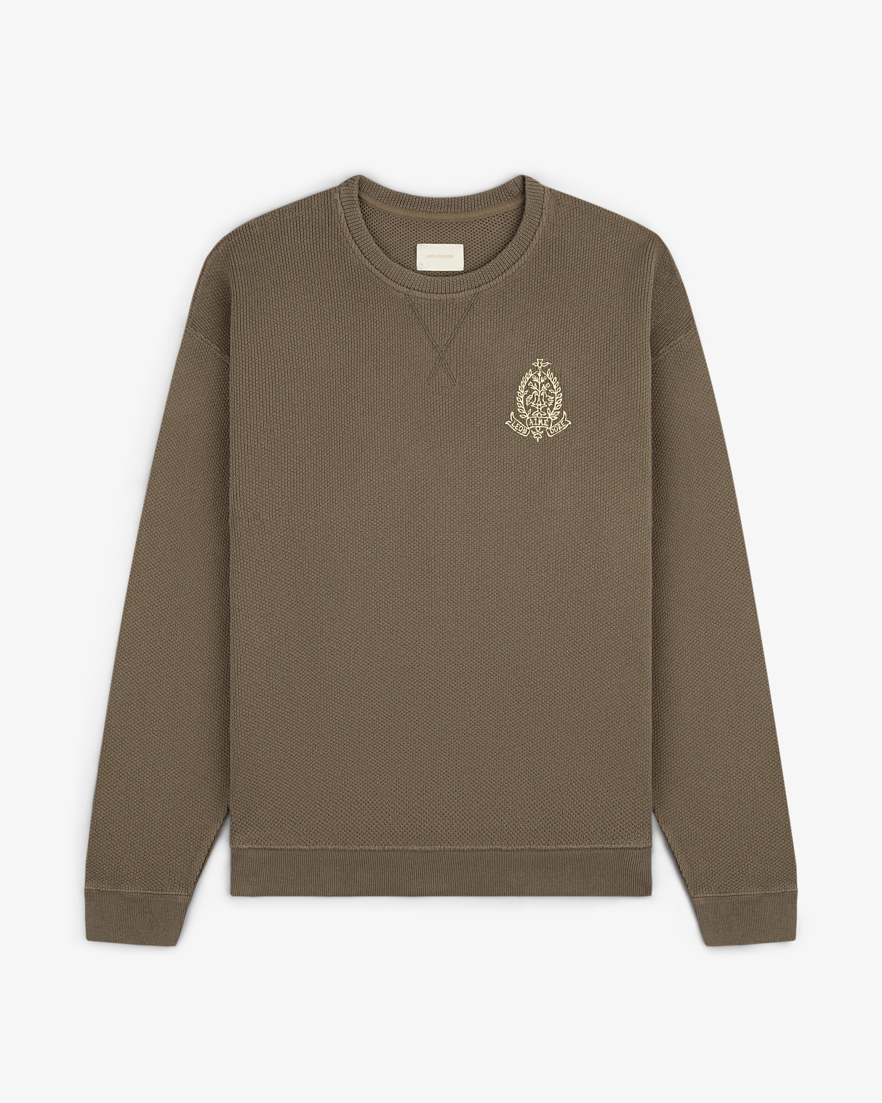 Saint George Piqué Crewneck Sweatshirt—brown, long sleeves, small embroidered logo on left chest.