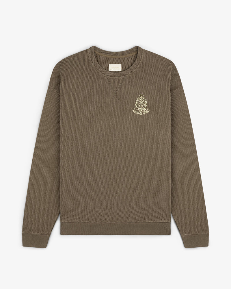 Saint George Piqué Crewneck Sweatshirt—brown, long sleeves, small embroidered logo on left chest.
