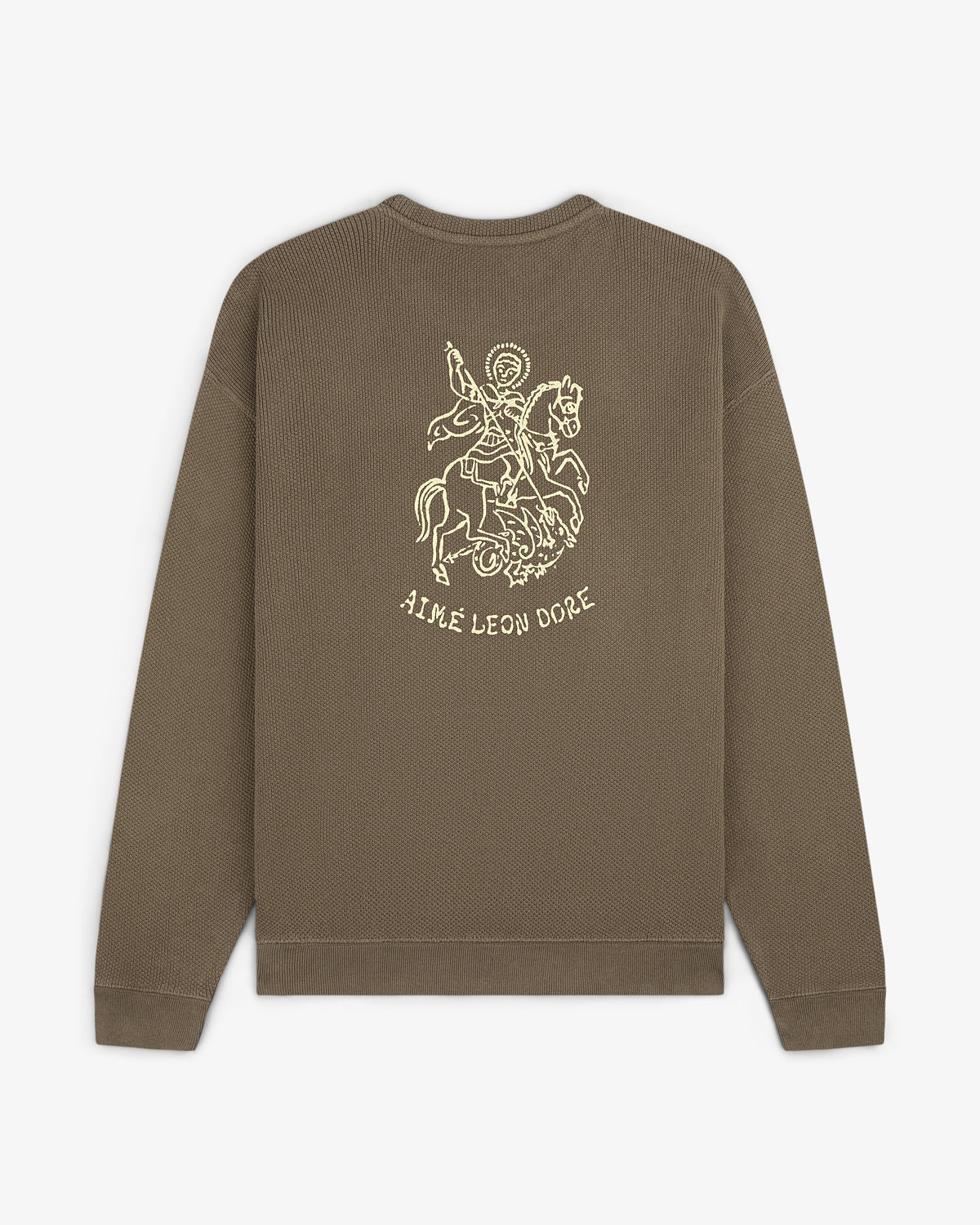 Olive green Saint George Piqué Crewneck with knight line drawing and AIMÉ LEON DORE text on the back.