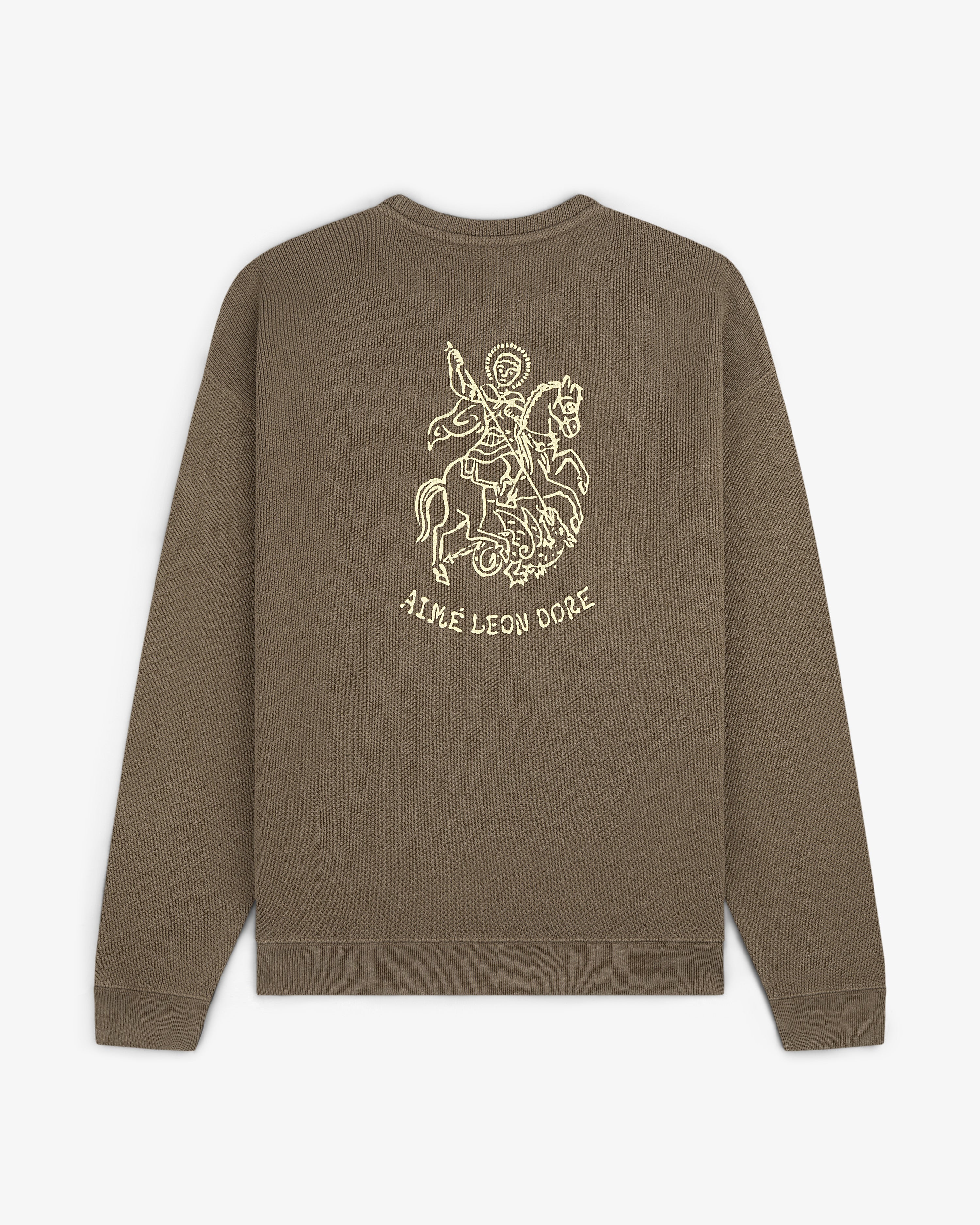 Olive green Saint George Piqué Crewneck with knight line drawing and AIMÉ LEON DORE text on the back.