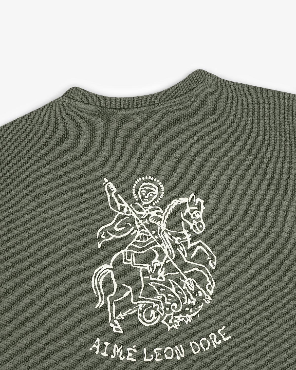 Green textured Saint George Piqué Crewneck Sweatshirt with a white knight graphic above AIMÉ LEON DORE text.