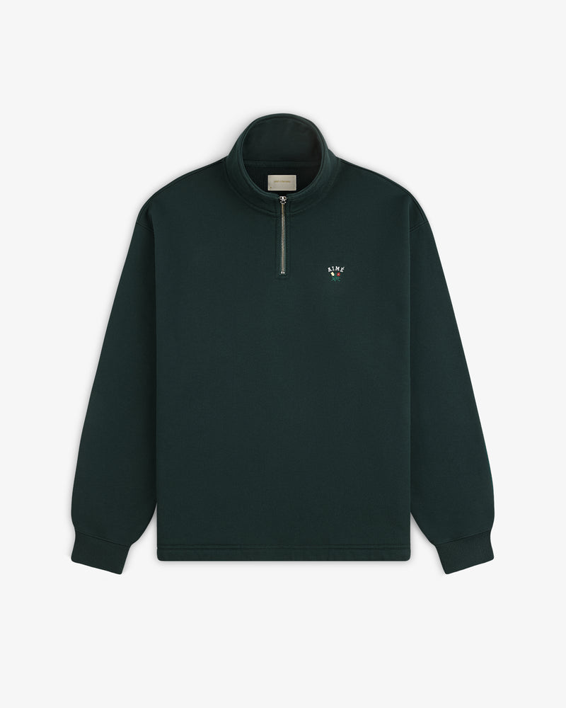 Crest Quarter Zip Pullover in dark green with stand-up collar and small embroidered logo on left chest.