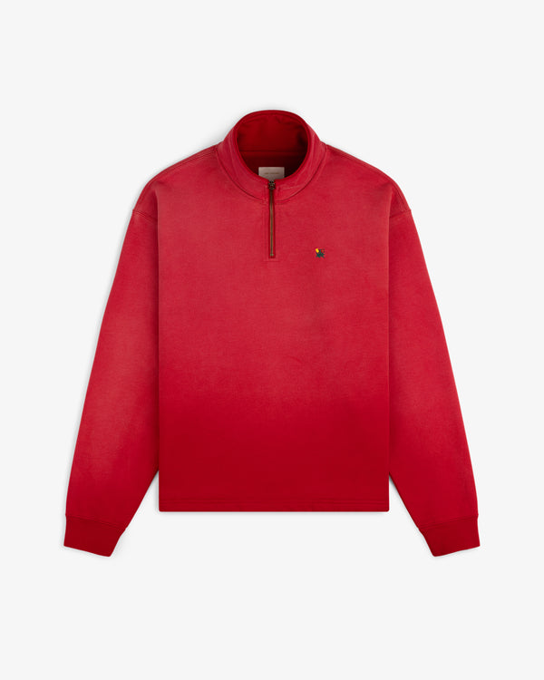 Sun Faded Crest Quarter Zip in red ombré with a small chest logo, shown flat on a white background.
