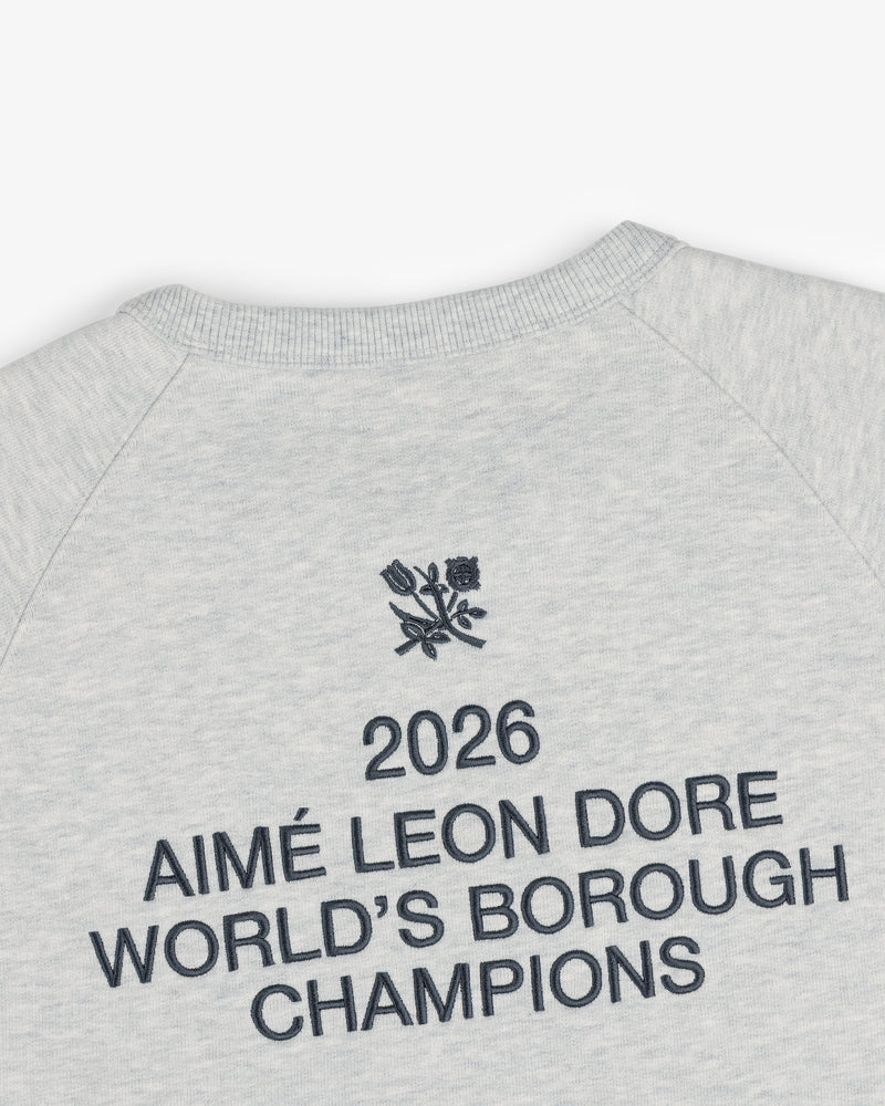 ALD / Technics World Champions Crewneck: Gray sweatshirt with black “2026 Aimé Leon Dore World’s Borough Champions” text and floral logo.