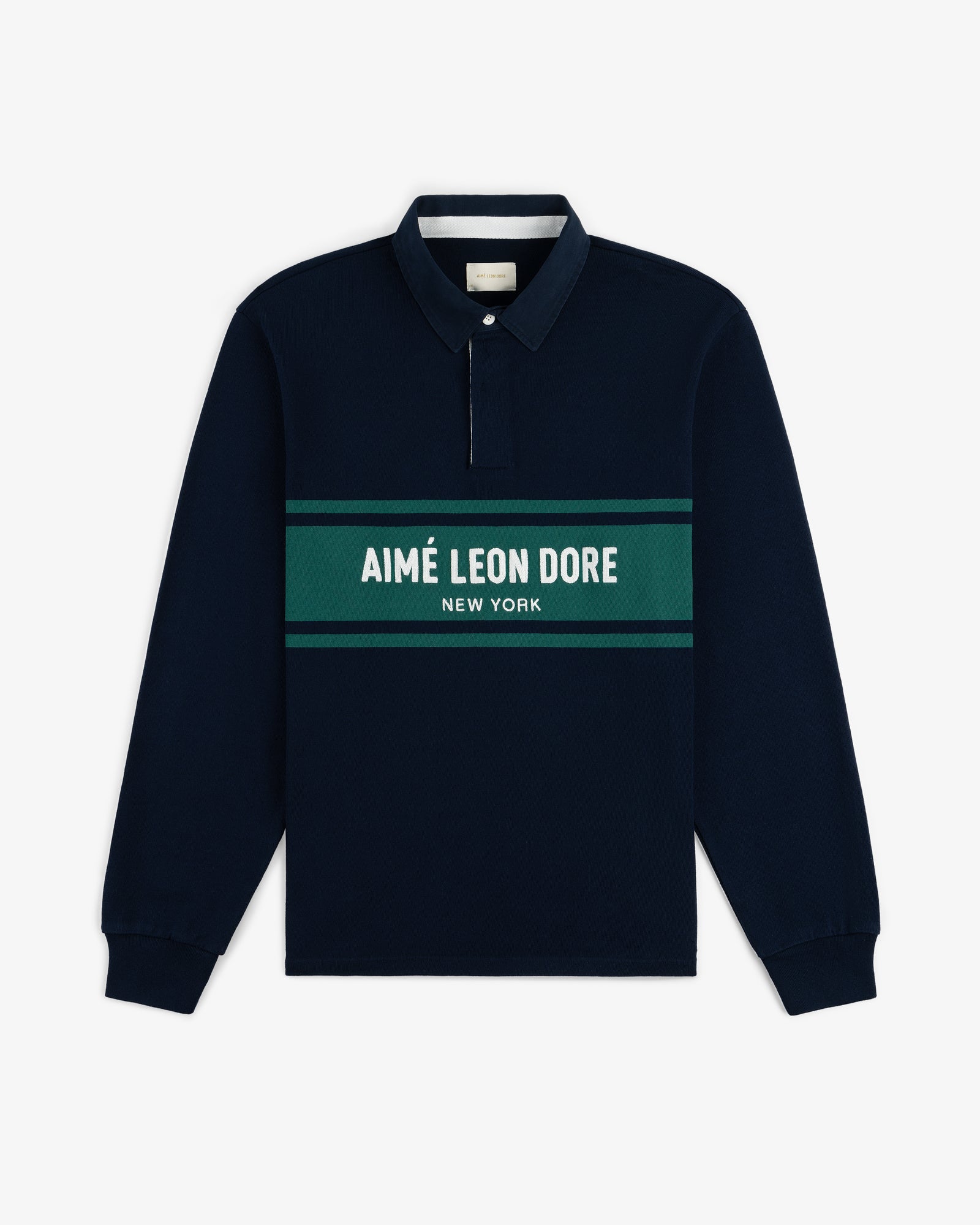 Chest Stripe Logo Rugby in navy with green stripes and AIMÉ LEON DORE NEW YORK text across the chest.