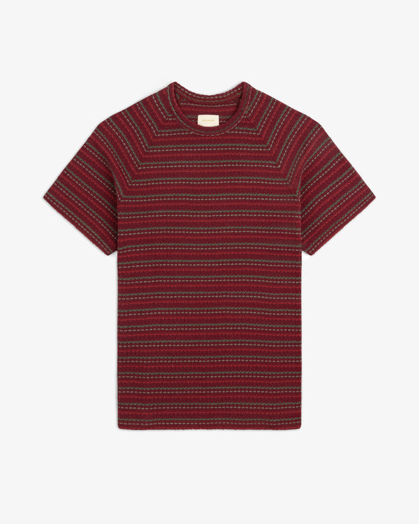 Jacquard Striped Tee with red and dark stripes, short sleeves, laid flat on a white background.