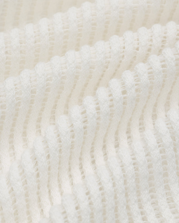 Close-up of the white Mesh V-Neck Tee showing its ribbed, textured fabric with evenly spaced horizontal ridges.