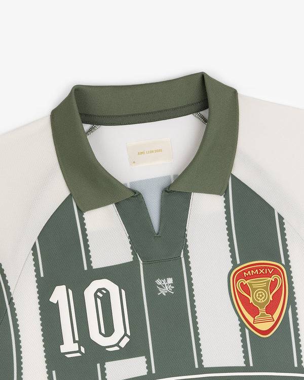 Aimé Cup Soccer Jersey in green and white with number 10, short collar, and red trophy patch.