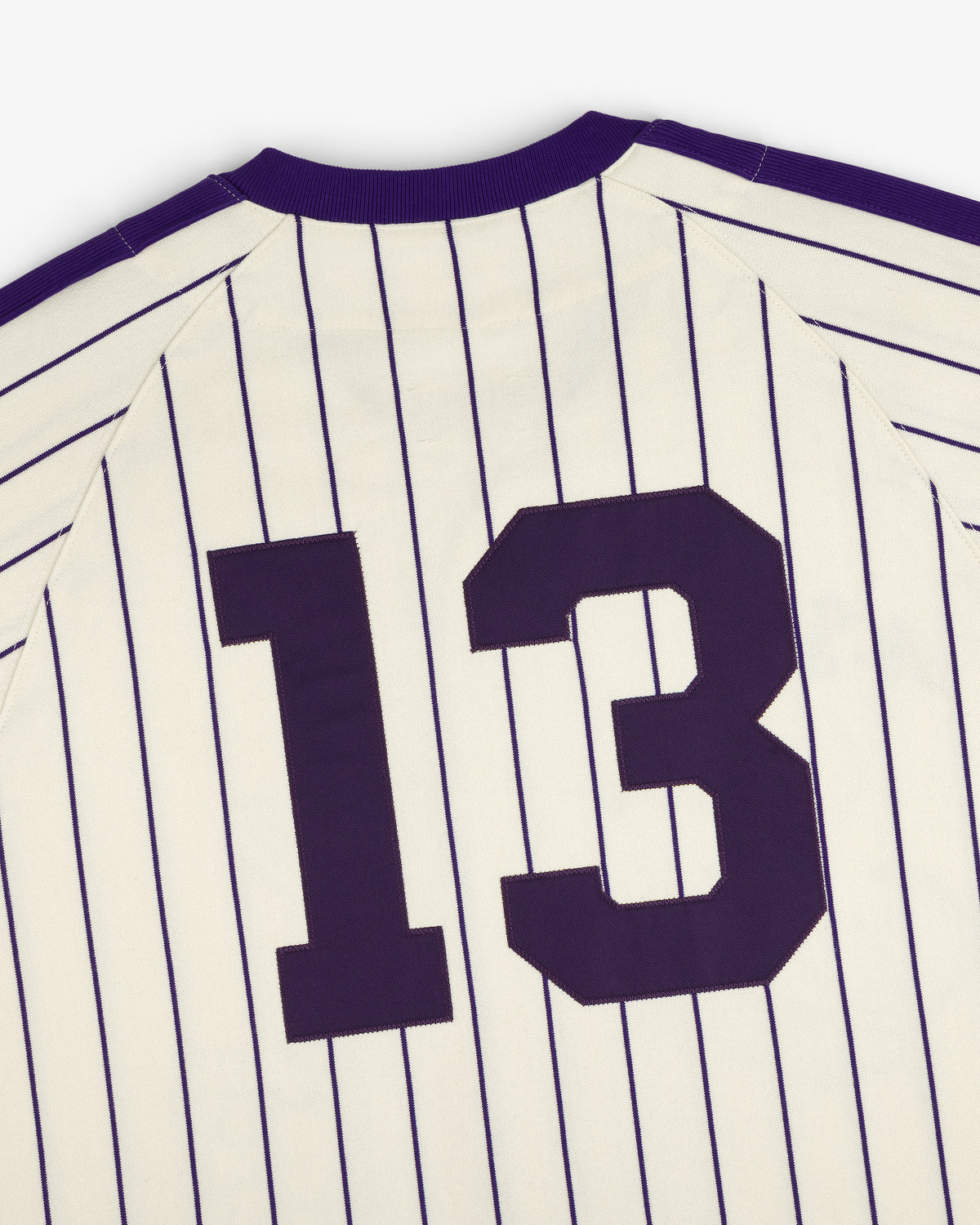 Aimé Baseball Jersey: White pinstripe design with large dark number 13 on the back.