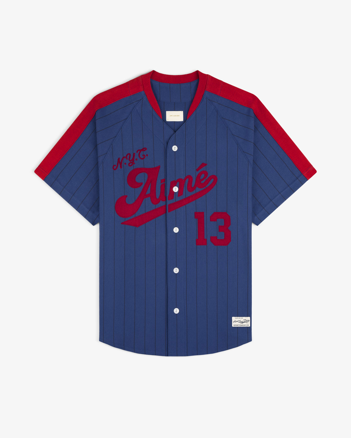 Aimé Baseball Jersey in blue and red with N.Y.C. Aimé, number 13, pinstripes, and button closure on the front.