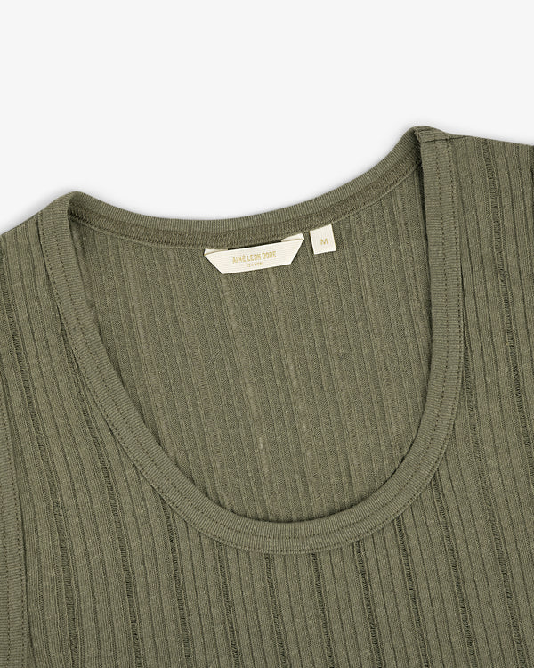 Close-up of a Drop Needle Tank Top in olive green with ribbed knit, scoop neckline, and visible label inside the collar.