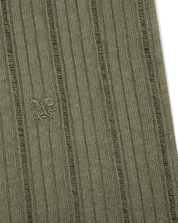 Close-up of ribbed olive green Drop Needle Tank Top with a small embroidered logo on the left side.