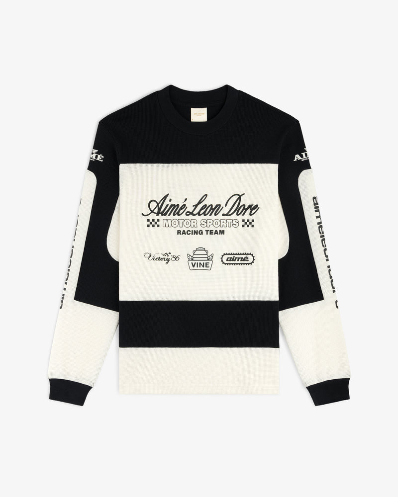 Black and white Long-Sleeve Mesh Enduro Tee featuring racing graphics and Aimé Leon Dore Motor Sports Racing Team text on front.