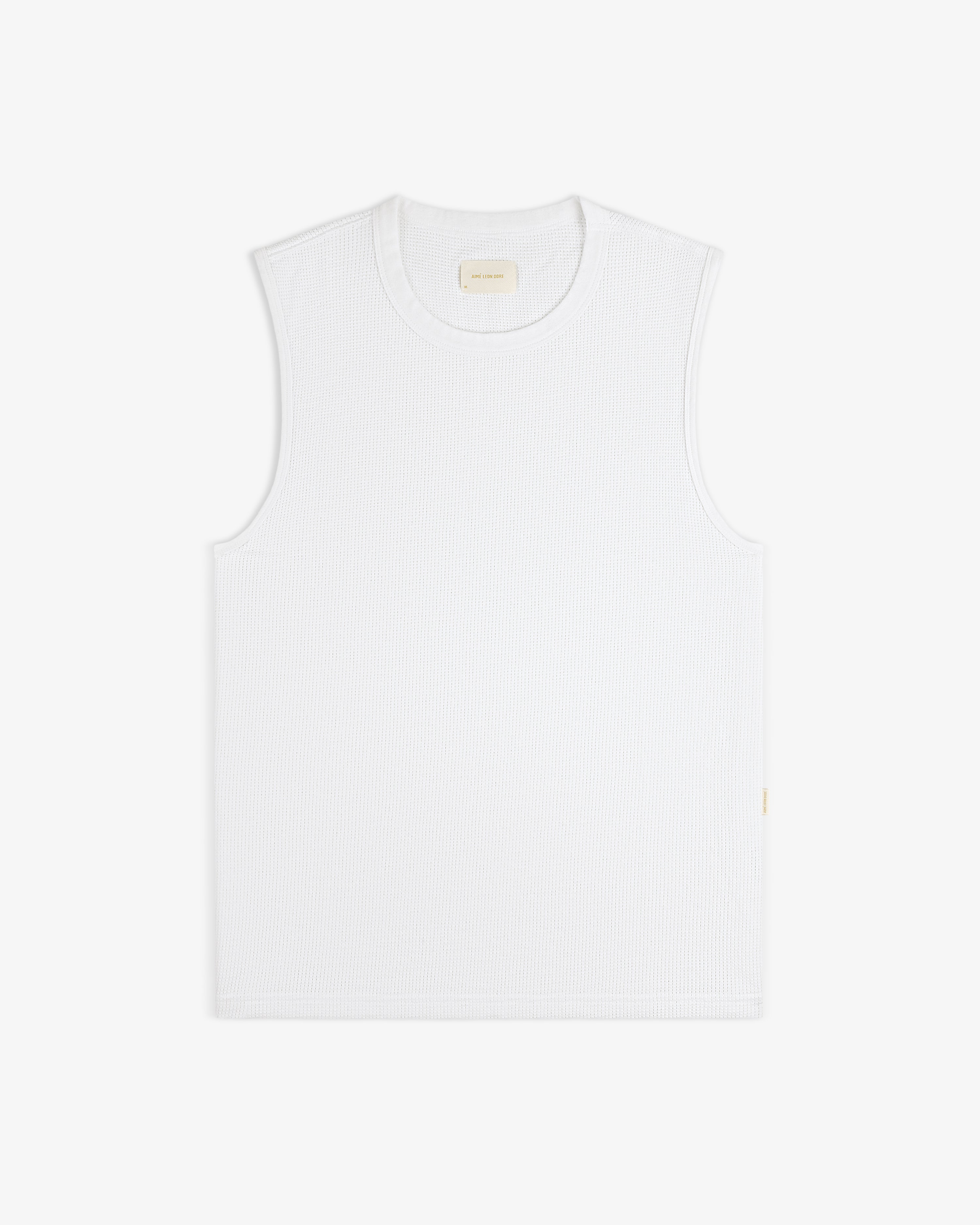Mesh Muscle Tank in white, sleeveless and textured, laid flat on a white background.
