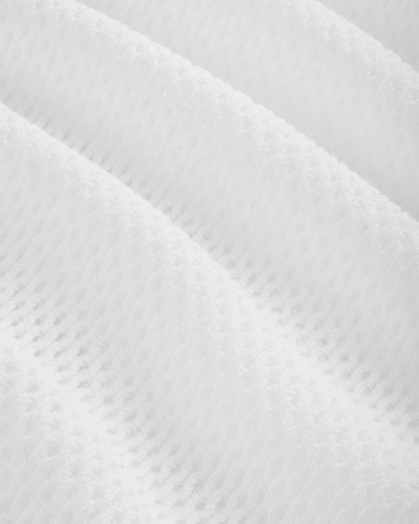 Close-up of the Mesh Tank Top's white fabric featuring a soft, mesh pattern with diagonal ridges.