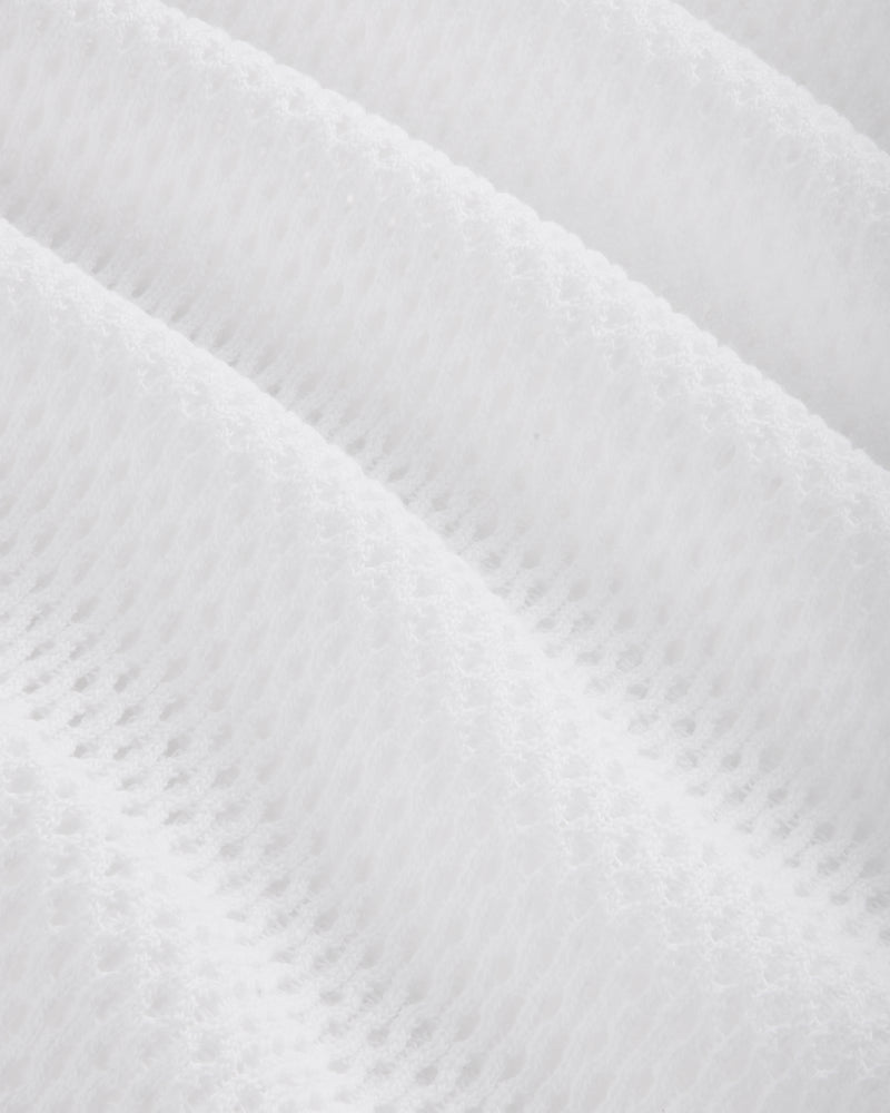 Close-up of the Mesh Tank Top's white fabric featuring a soft, mesh pattern with diagonal ridges.