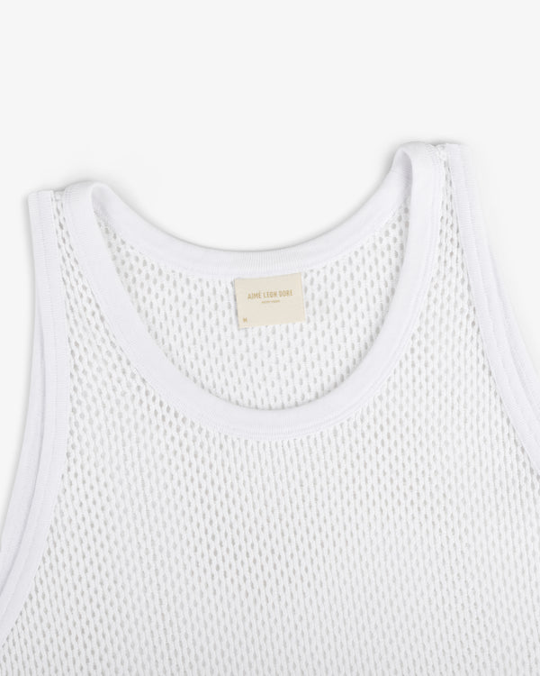 Mesh Tank Top featuring white mesh fabric, ribbed edges, and a beige neck label on a plain white background.