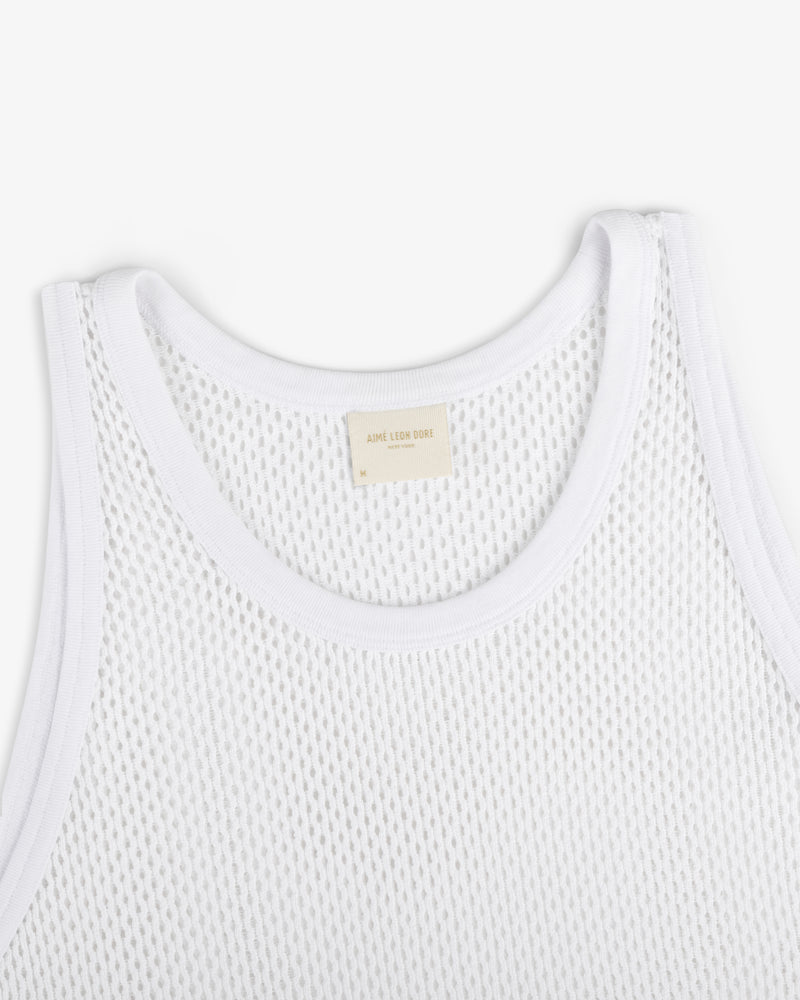 Mesh Tank Top featuring white mesh fabric, ribbed edges, and a beige neck label on a plain white background.