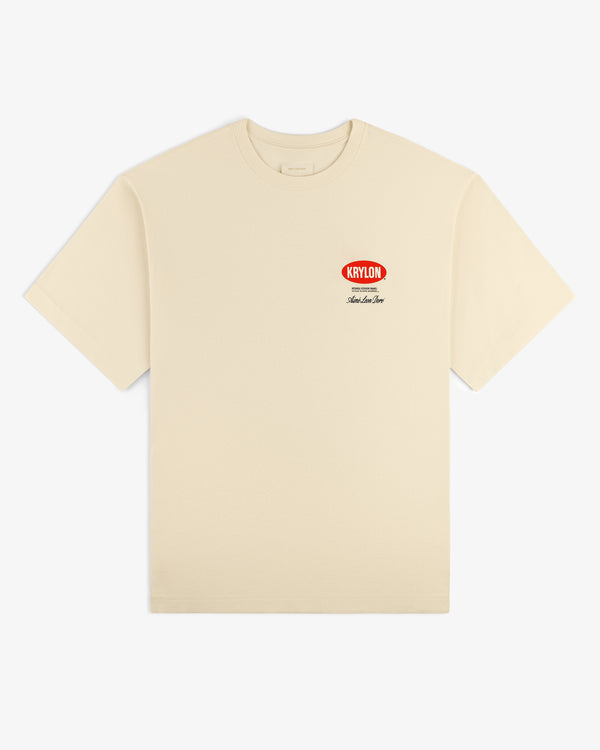 Krylon Logo Tee in beige with a red Krylon logo and "Let the Love Spray" text on the upper left chest.