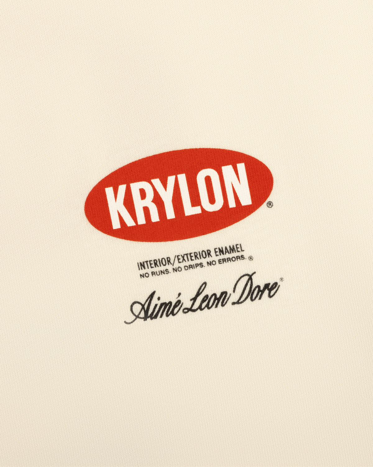 Krylon Logo Tee features a red oval KRYLON logo above black text and Aimé Leon Dore signature on cream background.