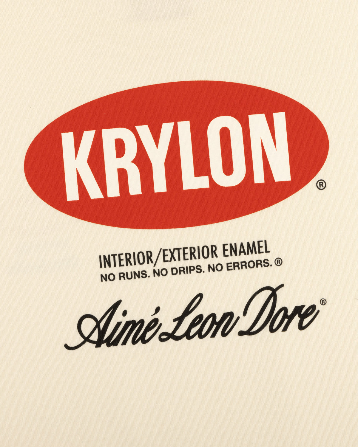 Krylon Logo Tee: Cream shirt featuring a red oval KRYLON logo with Aimé Leon Dore in black script below.