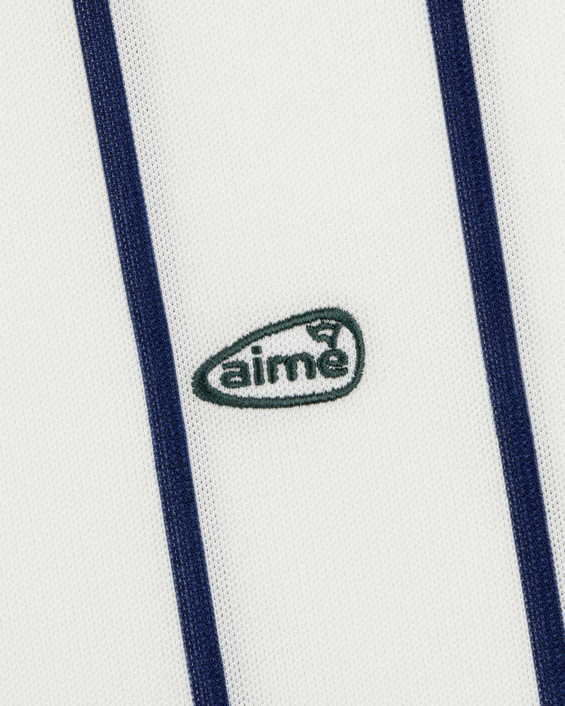 White ALD Golf Polo with vertical navy stripes and a small green aimé logo centered.