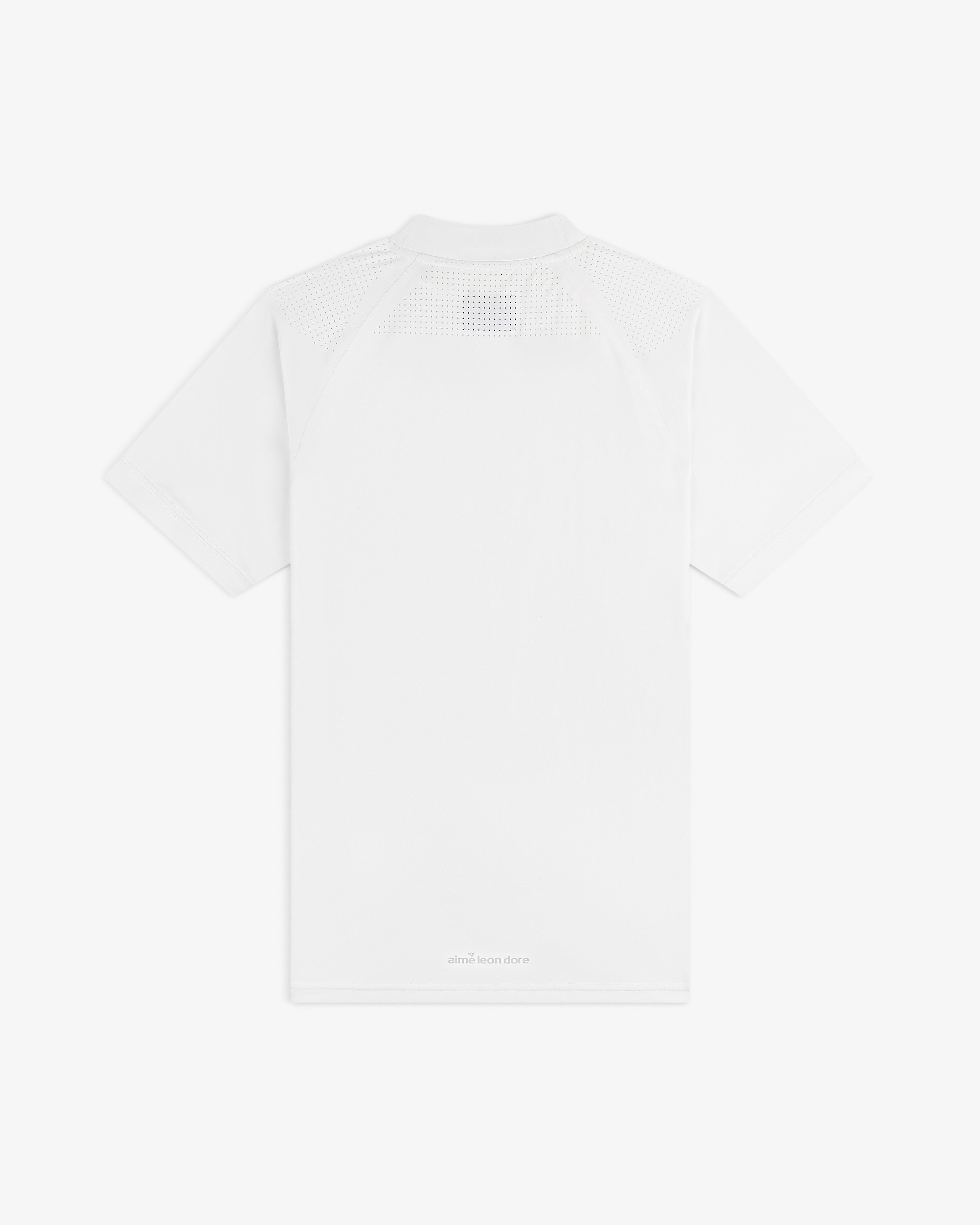 Back view of the ALD Golf Performance Tee, a plain white short-sleeve shirt with perforated upper back and shoulders.