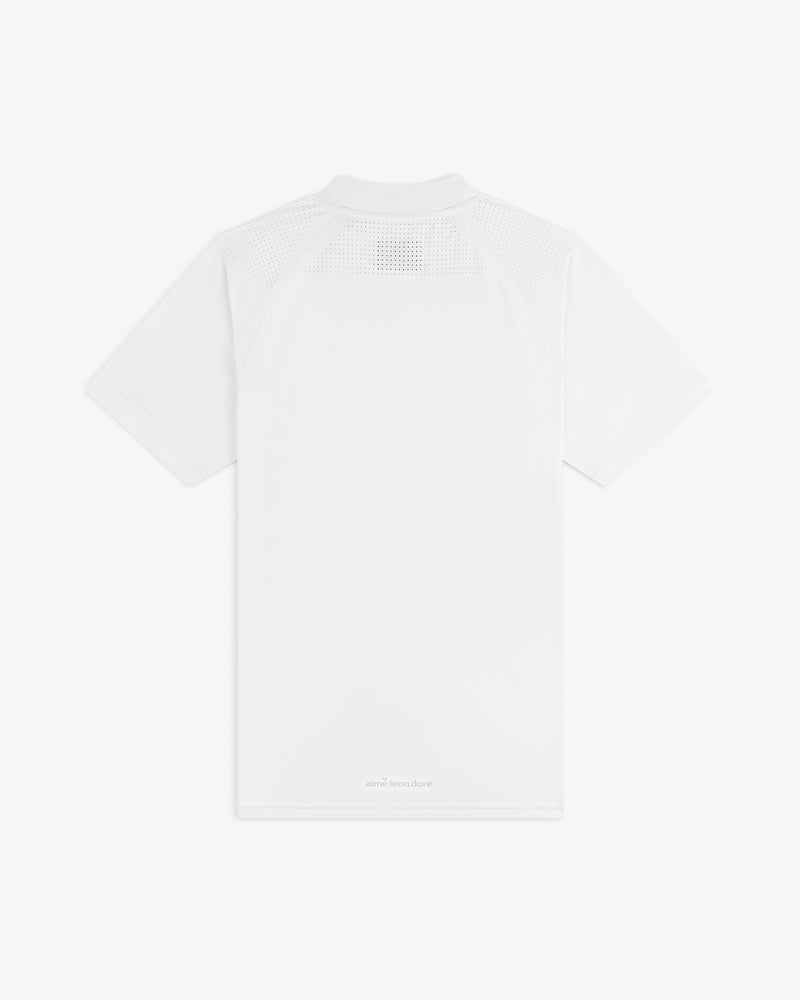 Back view of the ALD Golf Performance Tee, a plain white short-sleeve shirt with perforated upper back and shoulders.