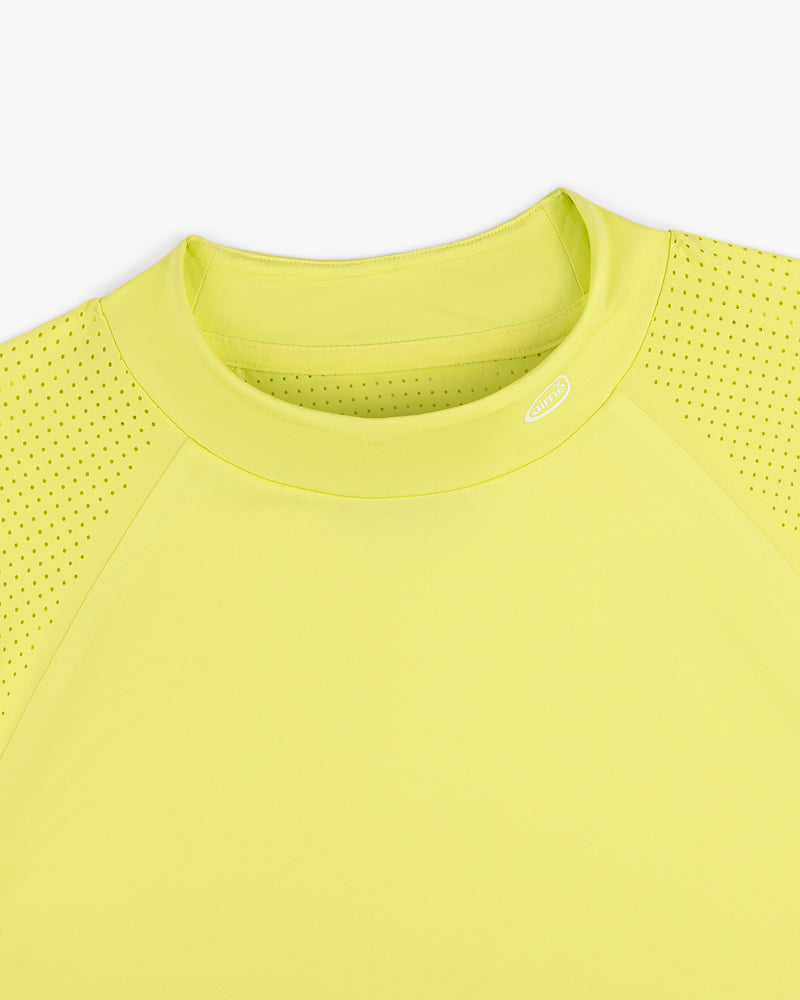 ALD Golf Performance Tee in bright yellow with perforated sleeves, shown neck down on a white background.