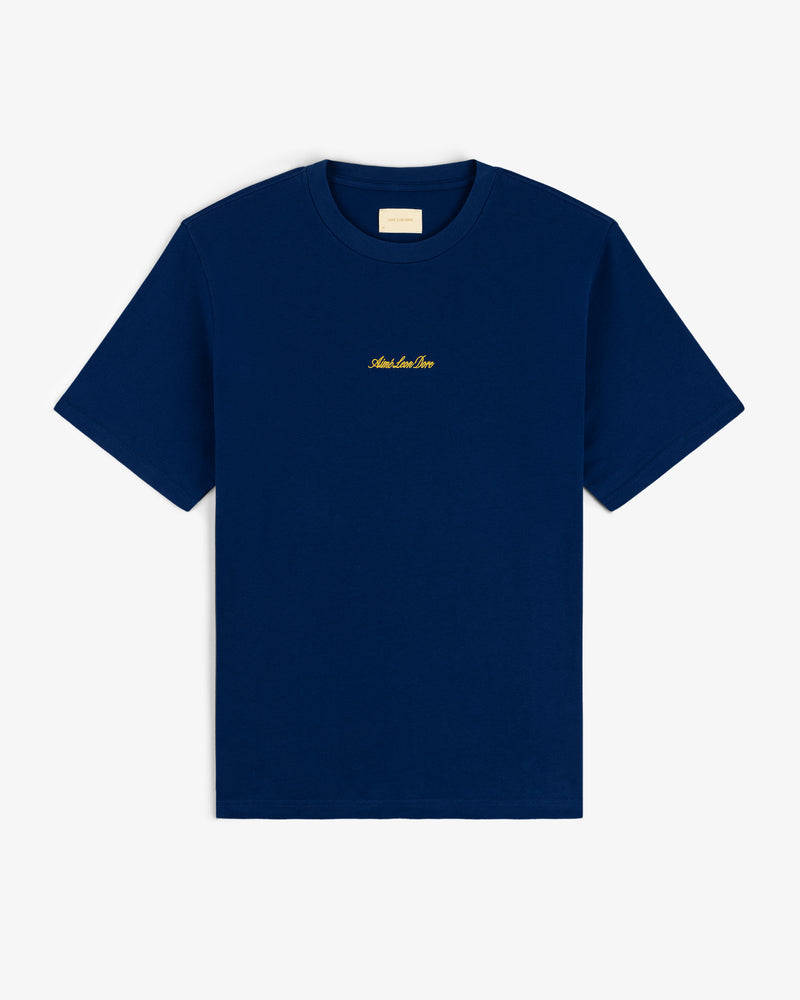 Embroidered Logo Tee in navy with gold chest embroidery, short sleeves, shown on a white background.