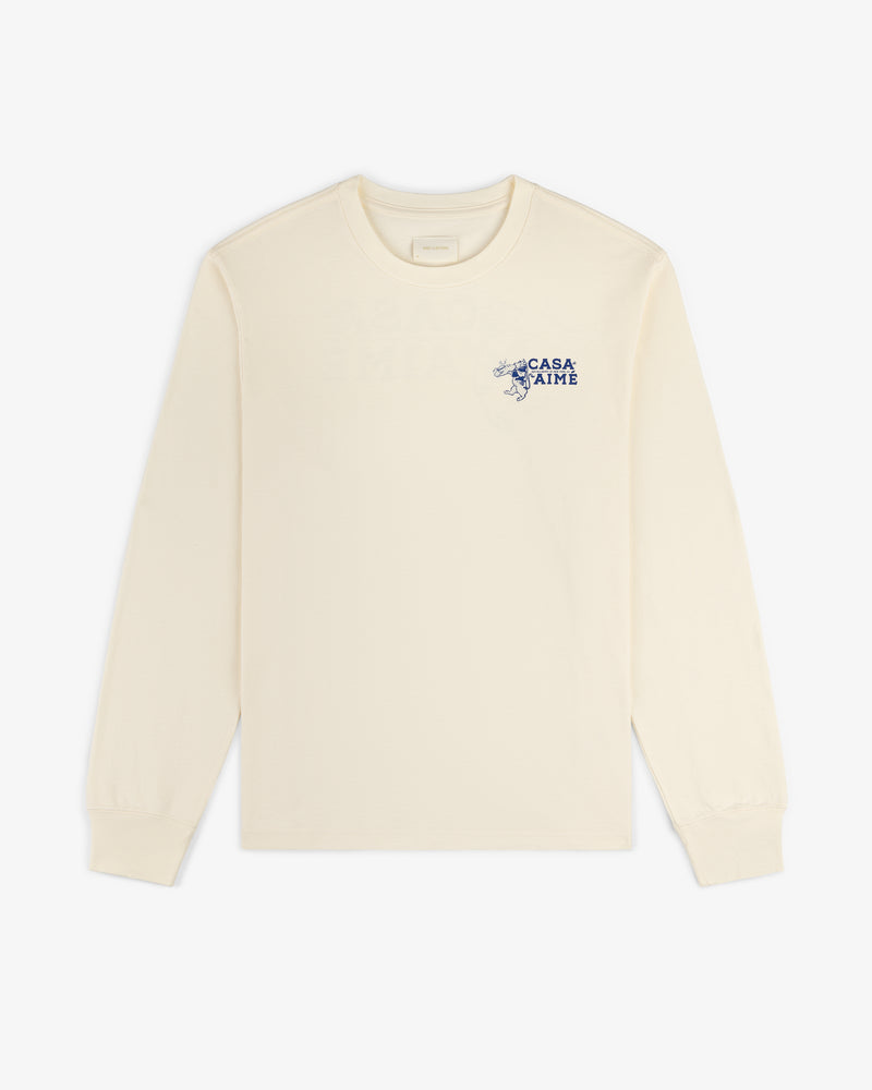 Long-Sleeve Casa Tee in cream with small blue CASA AIMÉ logo and graphic on the left chest.