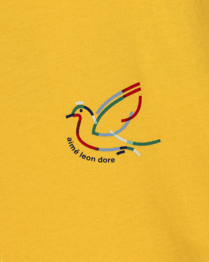 Minimalist, multicolored bird logo with aimé leon dore text on yellow Long-Sleeve Souvenir Tee.