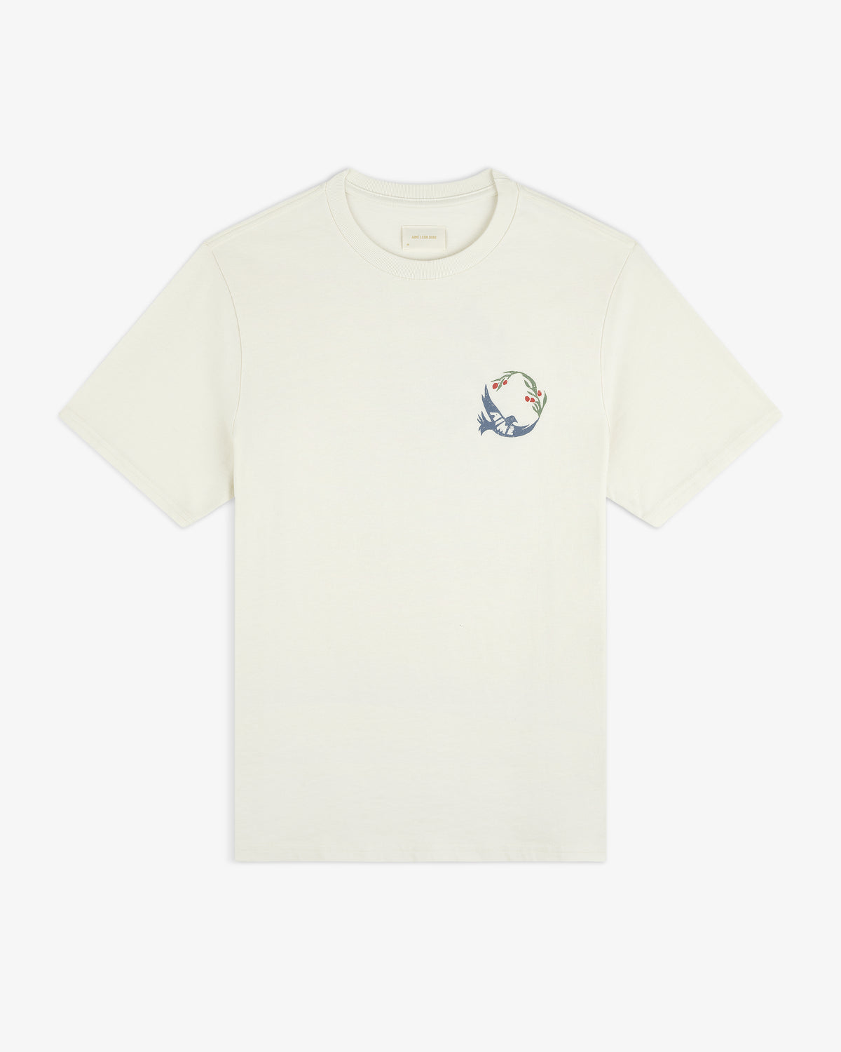 Woodblock Dove Tee: Off-white short-sleeve shirt with a small, colorful dove and floral design on the left chest.