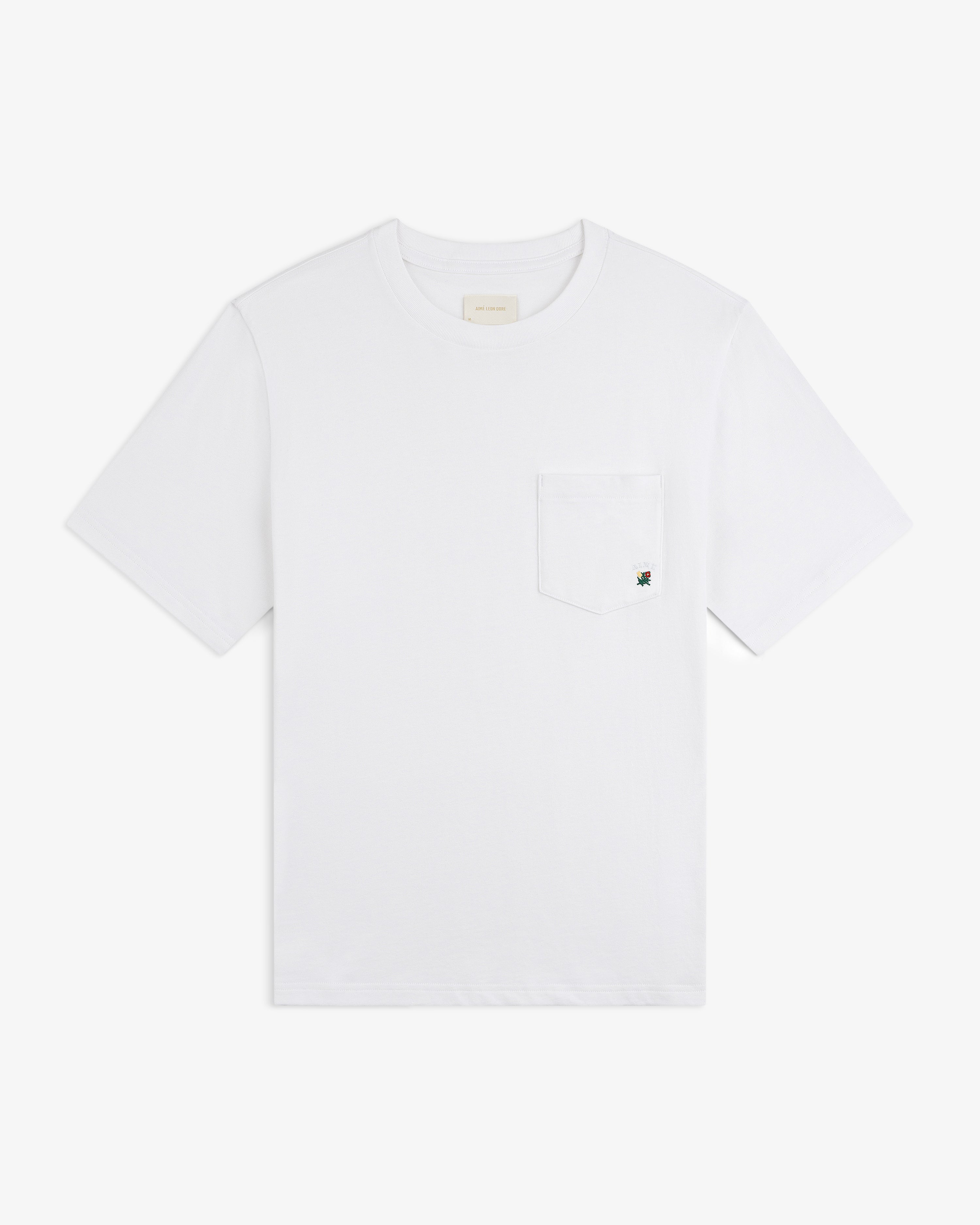 Crest Pocket Tee – plain white short-sleeve shirt with a small left chest pocket.