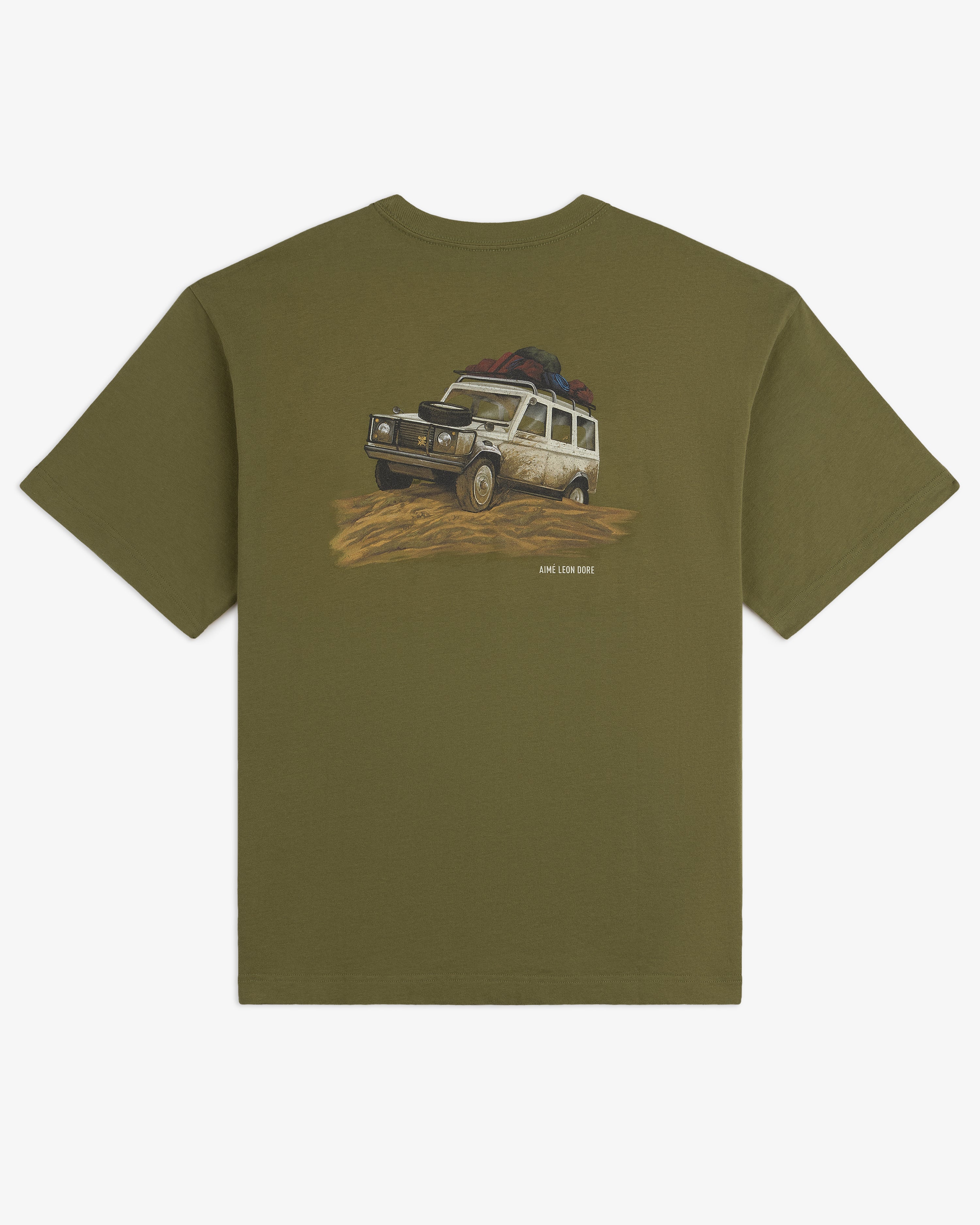 Safari Tee in olive green with a rugged SUV and rooftop gear illustrated driving off-road.