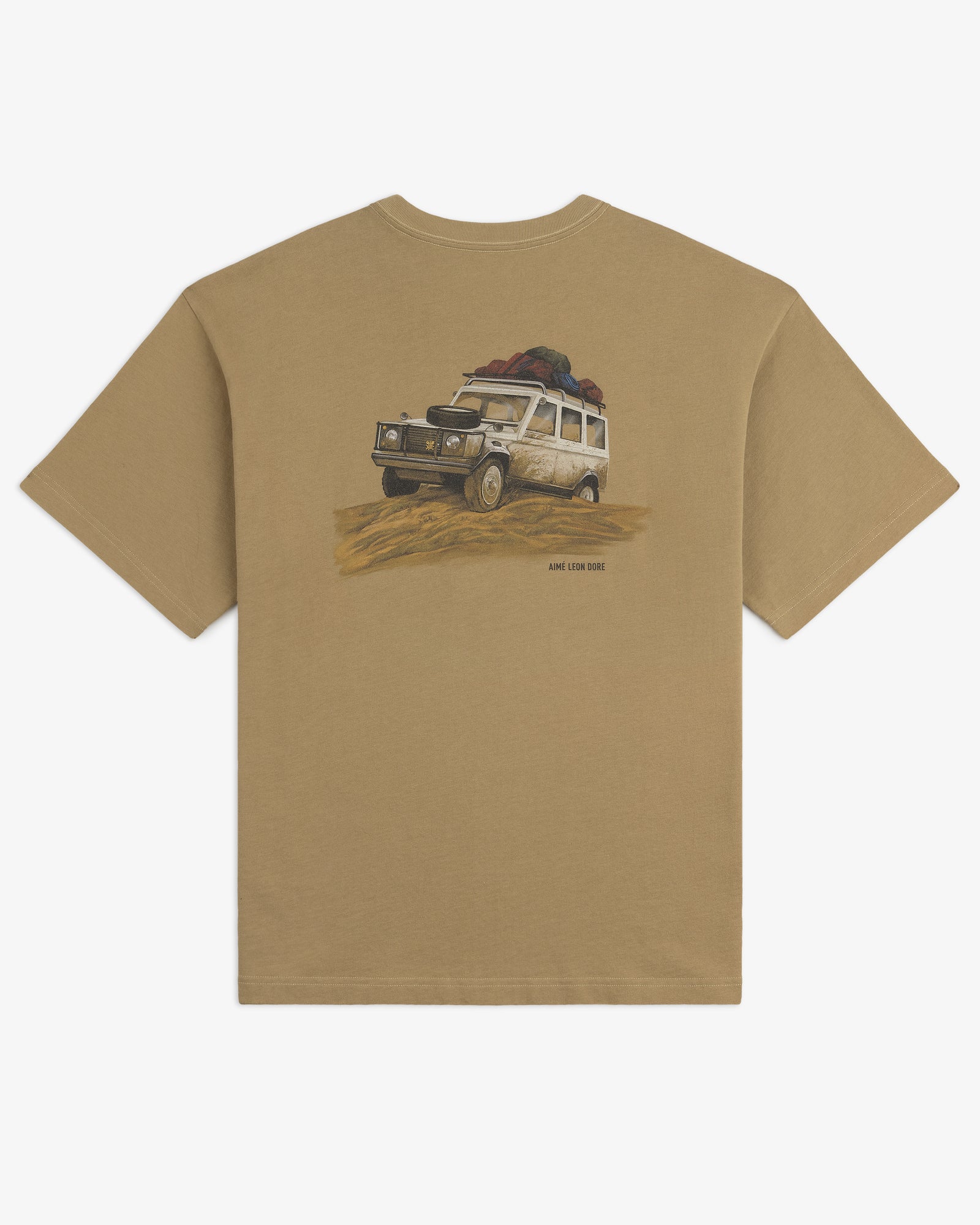 Safari Tee: Tan t-shirt featuring a graphic of an off-road vehicle with roof luggage driving through sand on the back.