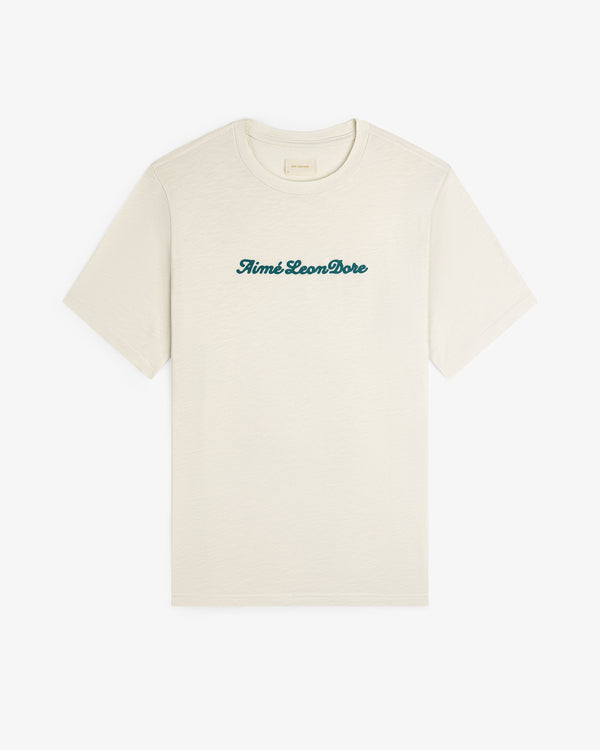 Off-white Puff Print Slub Logo Tee featuring Aimé Leon Dore in green script across the chest.