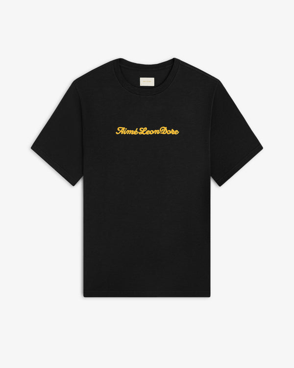 Black Puff Print Slub Logo Tee with yellow Aimé Leon Dore cursive text centered on the chest.